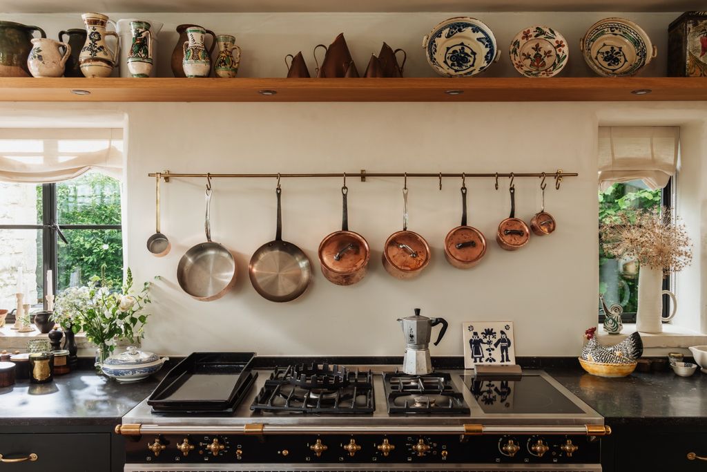 Image may contain Cookware Plate Cooktop Indoors Kitchen Person Cooking Pot Food Pot and Cooking Pan