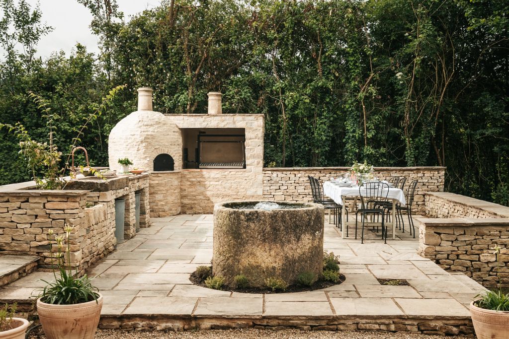 Image may contain Backyard Nature Outdoors Yard Architecture Building House Housing Patio Plant Path and Walkway