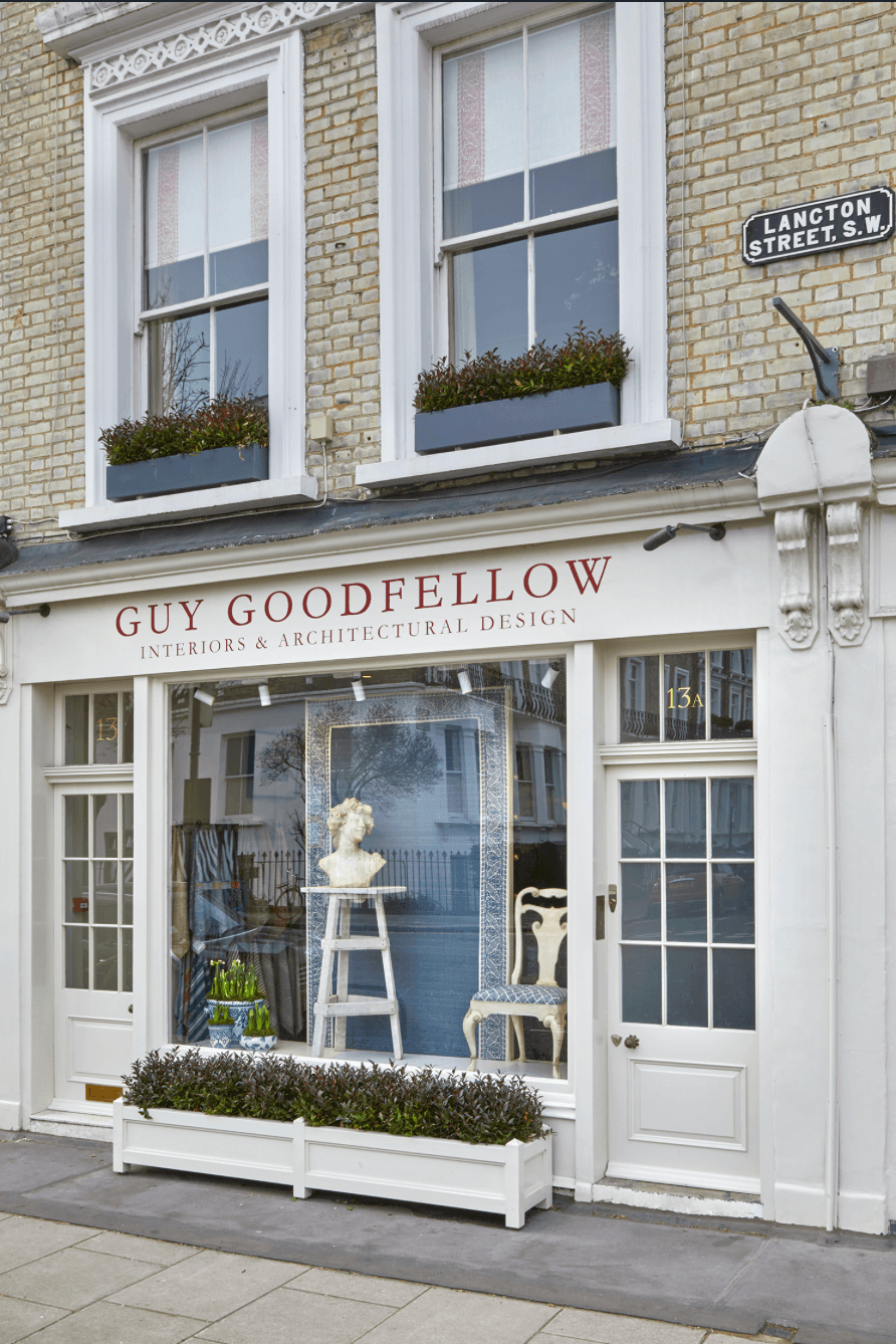 Image may contain Architecture Building Plant Door Window Chair Furniture and Shop