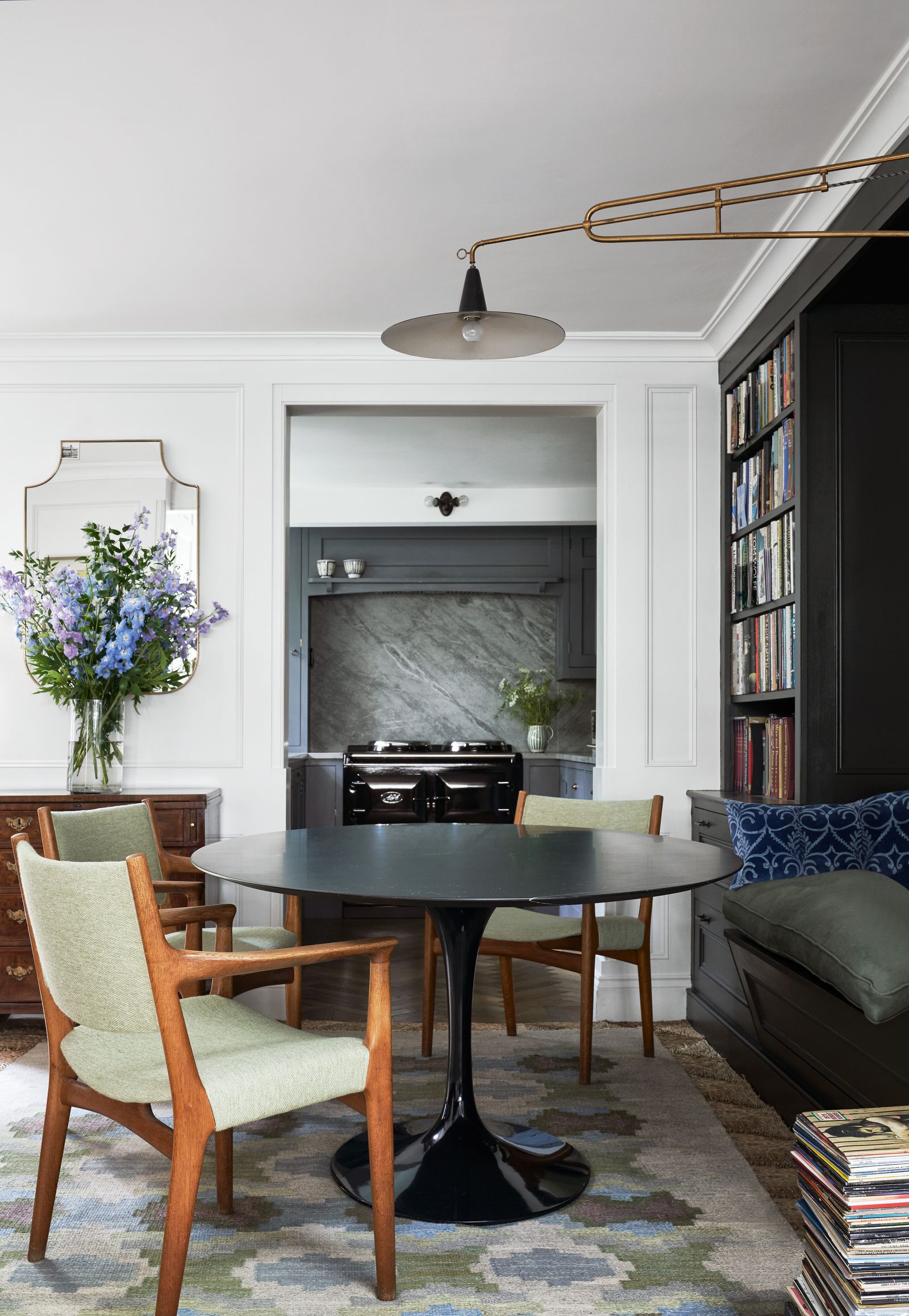 Image may contain Dining Table Furniture Table Architecture Building Dining Room Indoors Room Home Decor and Chair