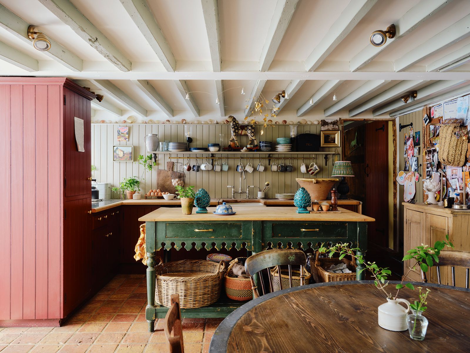 Image may contain Indoors Interior Design Plant Lamp Kitchen Chair Furniture Desk Table Art and Painting