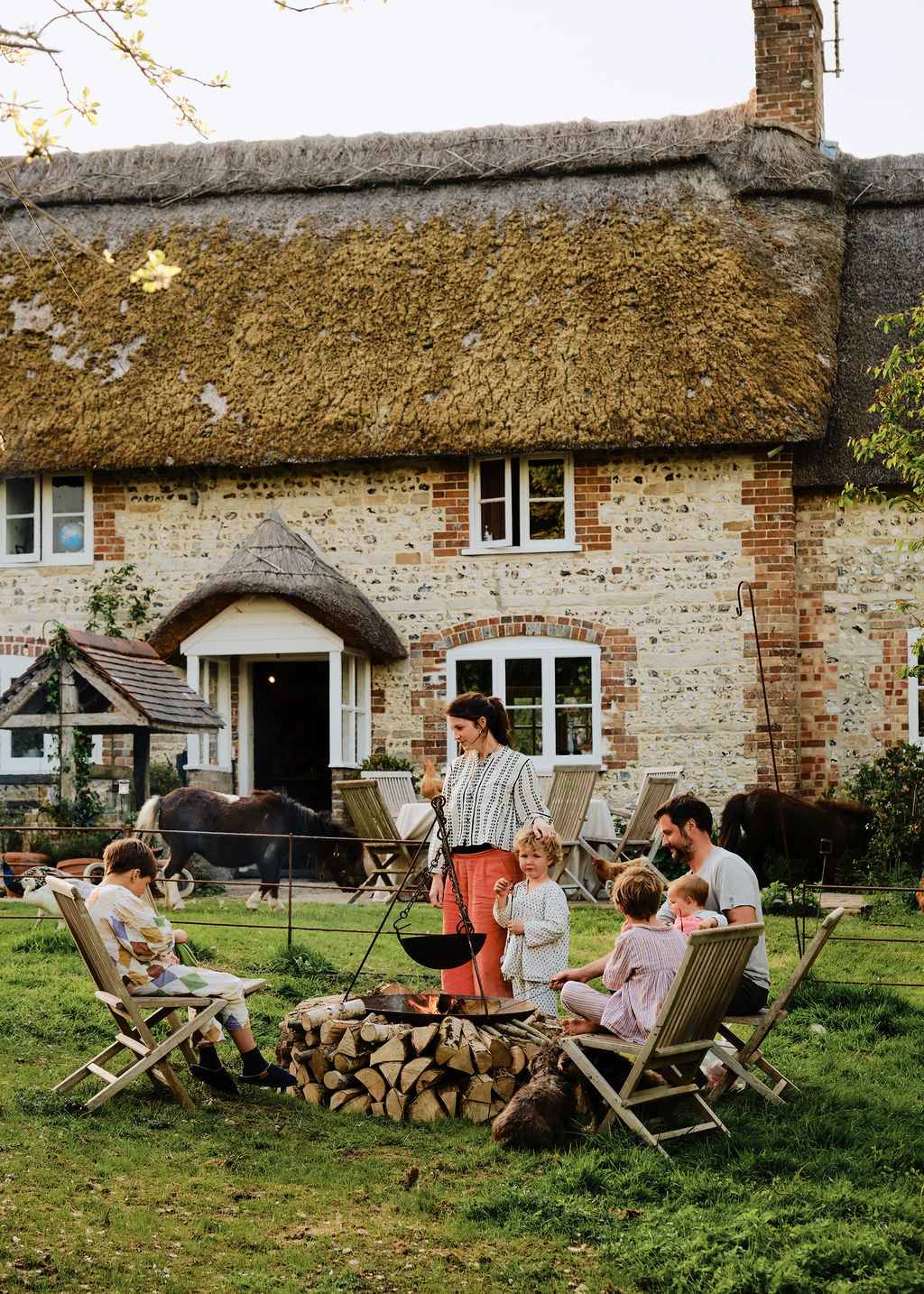 Image may contain Architecture Building Outdoors Shelter Grass Plant Backyard Nature Yard Cottage and House