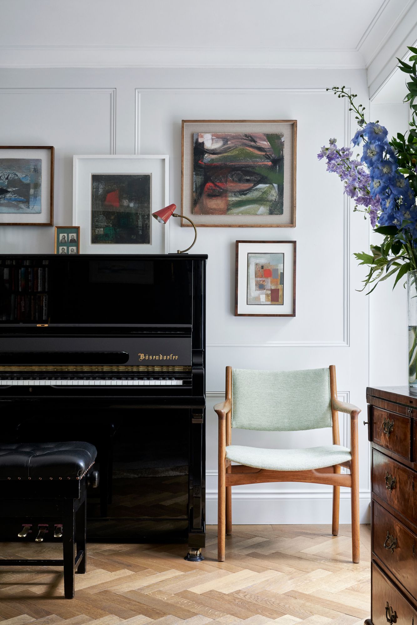 Image may contain Keyboard Musical Instrument Piano Lamp Art Painting Indoors Interior Design Chair and Furniture