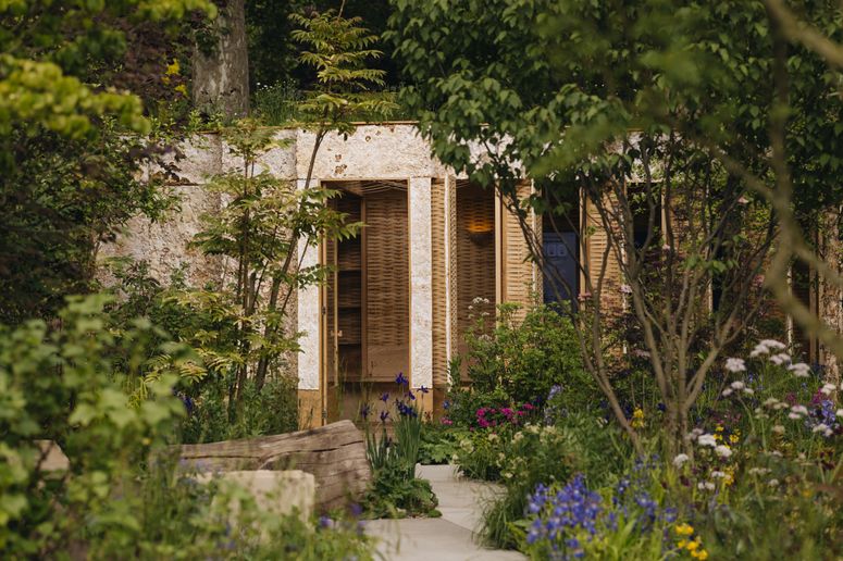 Image may contain: Architecture, Building, Cottage, House, Housing, Indoors, Interior Design, Hotel, Resort, and Plant