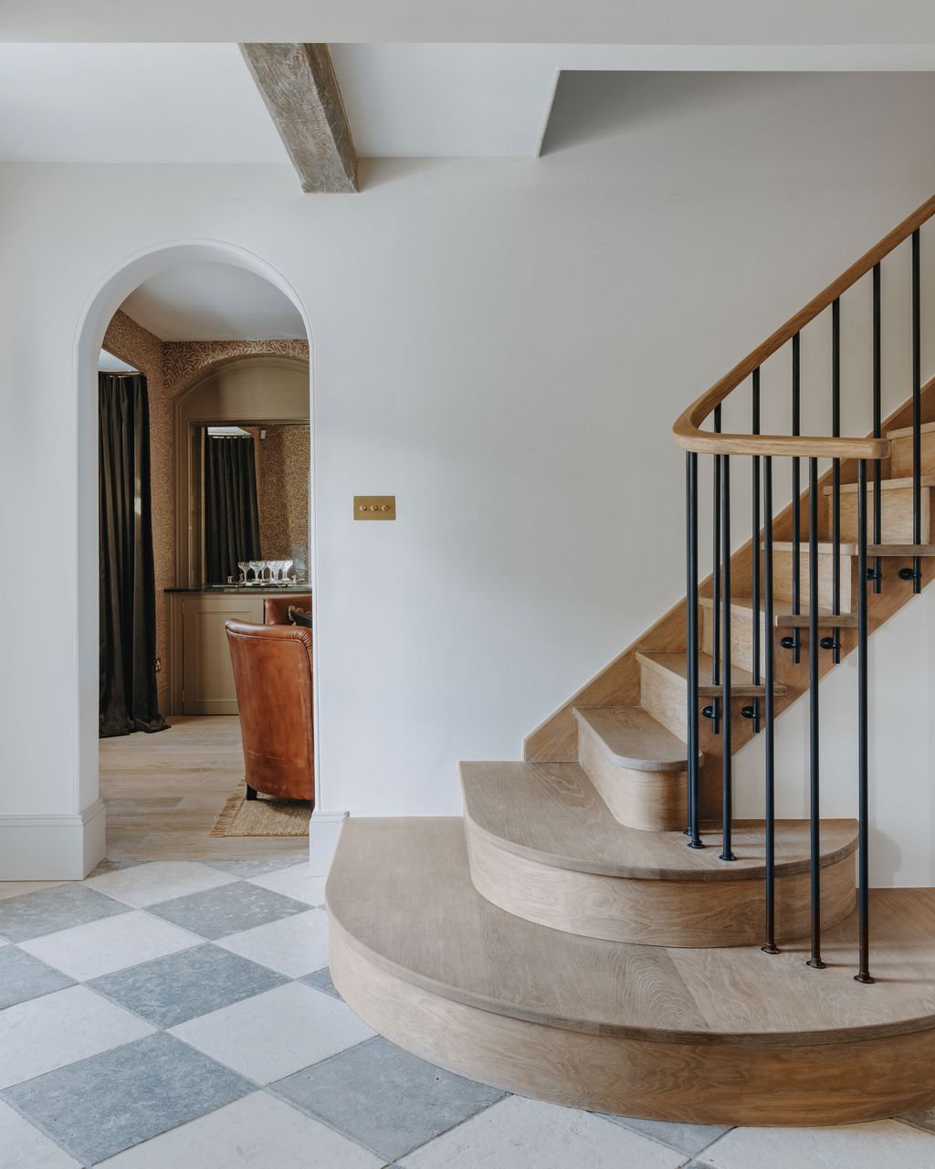 Image may contain Architecture Building House Housing Staircase Floor Flooring Home Decor Rug and Indoors