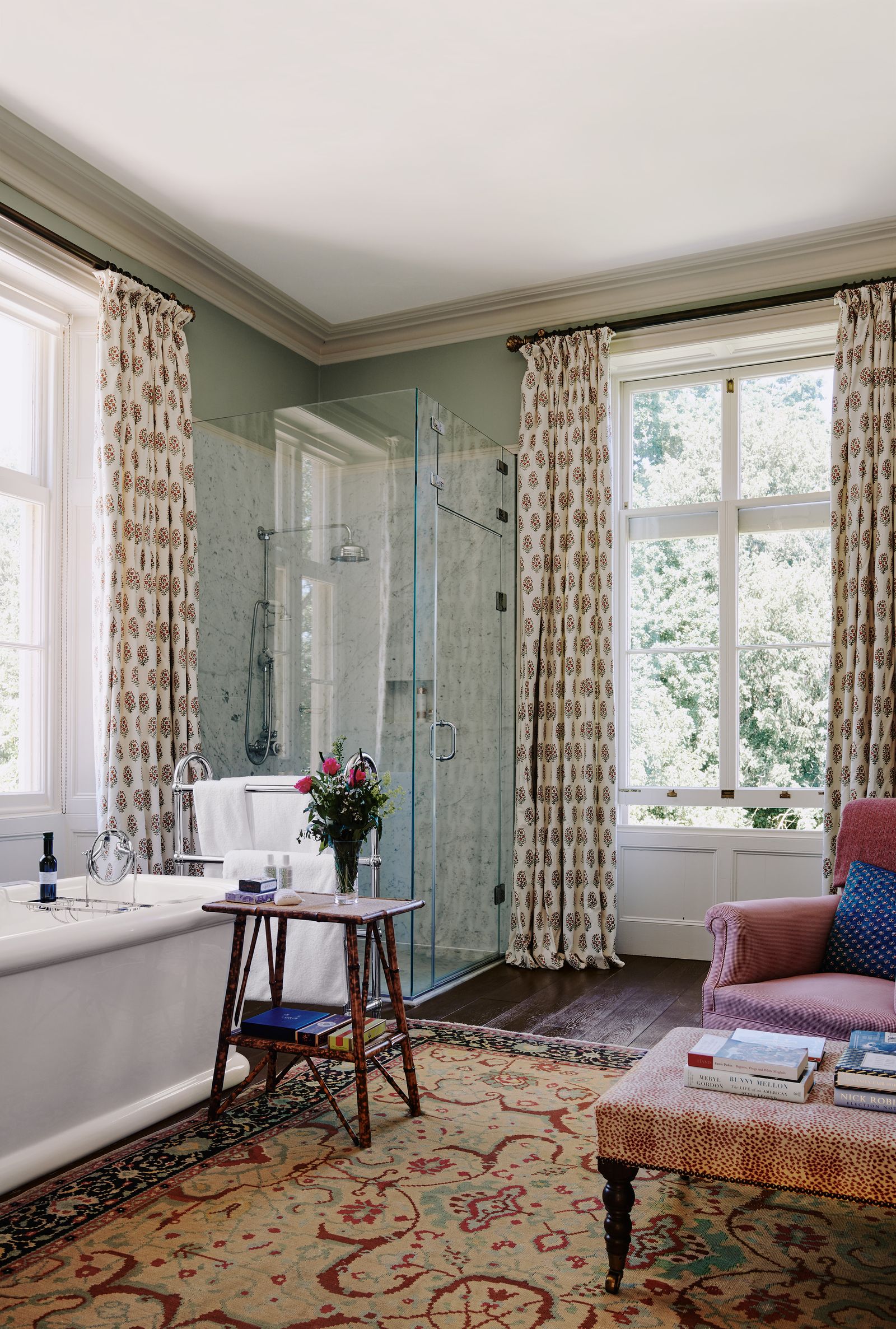 Image may contain Indoors Interior Design Home Decor Rug Desk Furniture Table Bathing Window Book and Publication