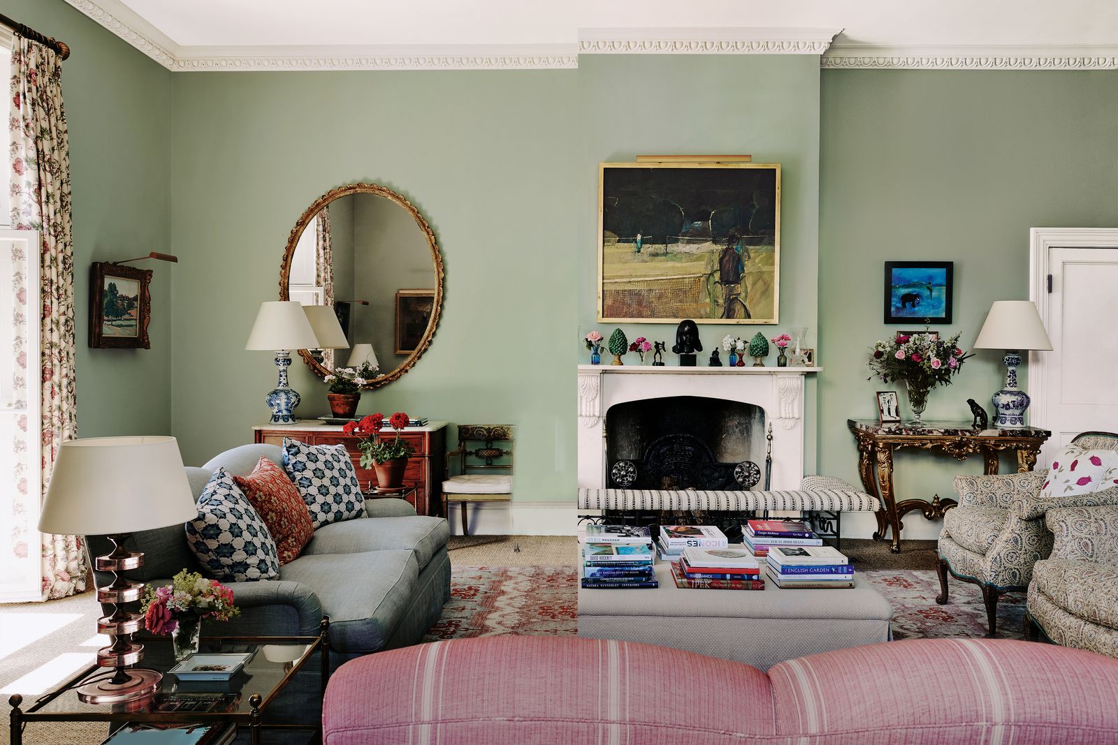 Image may contain Home Decor Lamp Architecture Building Furniture Indoors Living Room Room Desk Table and Art