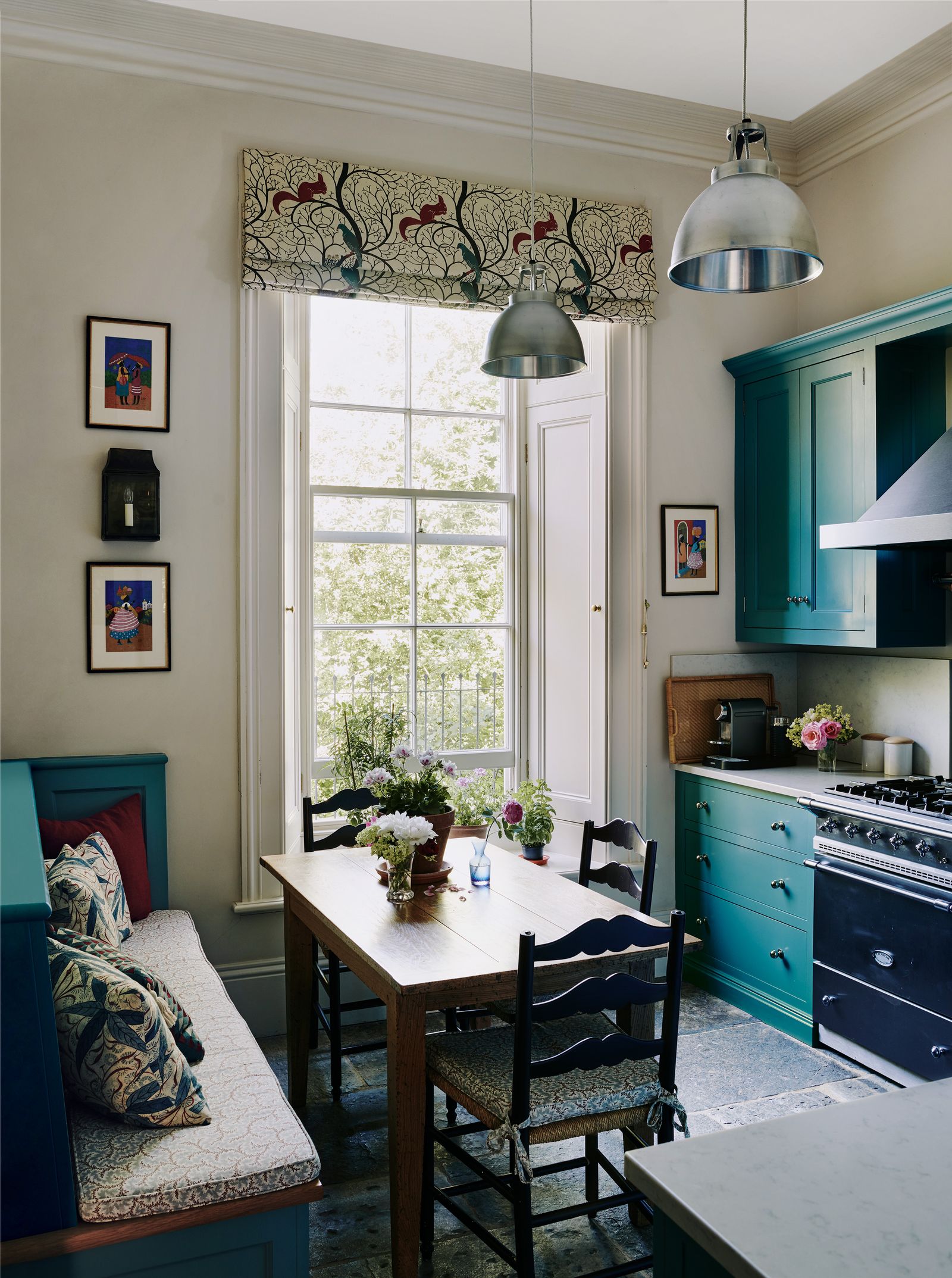 Image may contain Architecture Building Dining Room Dining Table Furniture Indoors Room Table Home Decor and Art