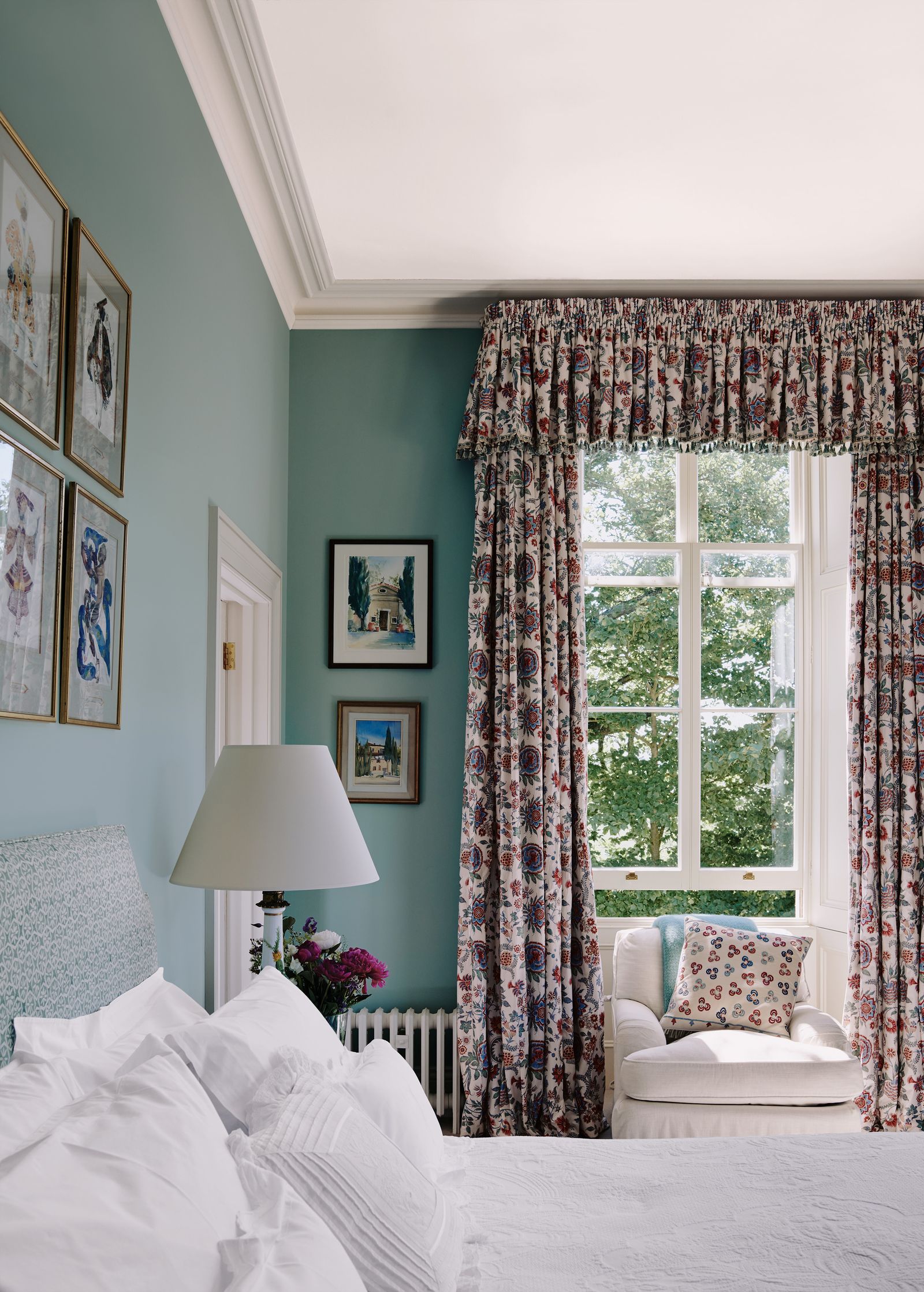 Image may contain Lamp Window Home Decor Art Painting Bed Furniture Table Lamp Indoors Interior Design and Cushion