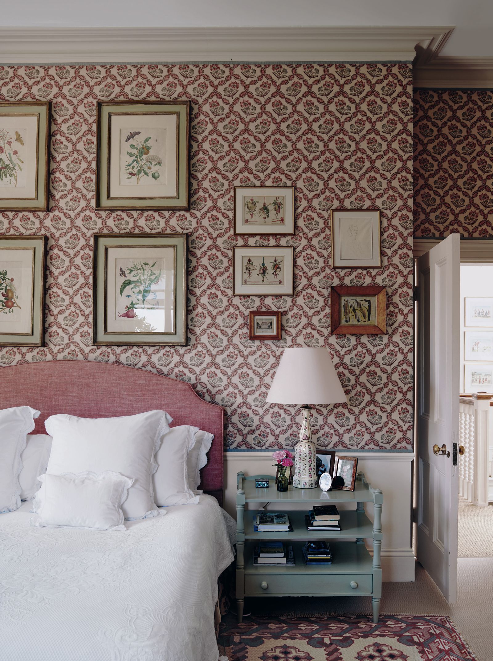 Image may contain Home Decor Lamp Indoors Interior Design Cushion Rug Art Painting Bed Furniture and Table Lamp