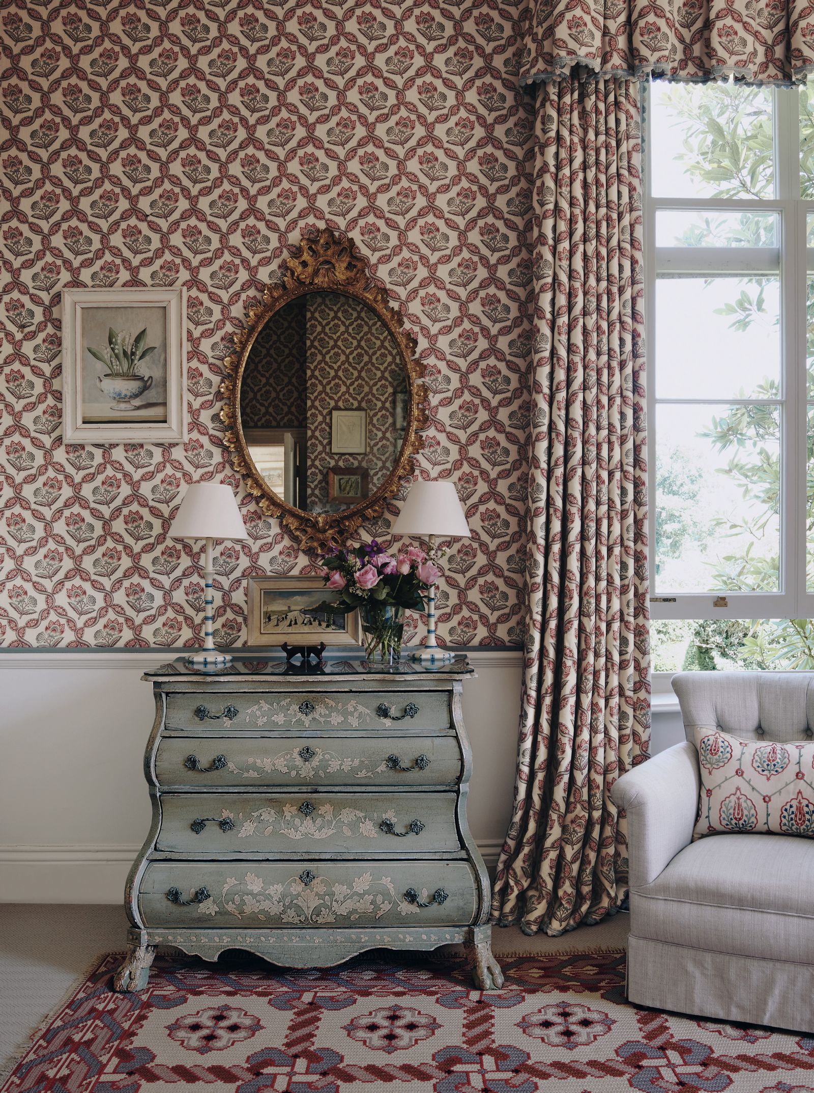 Image may contain Lamp Home Decor Rug Couch Furniture Art Painting Plant Indoors and Interior Design