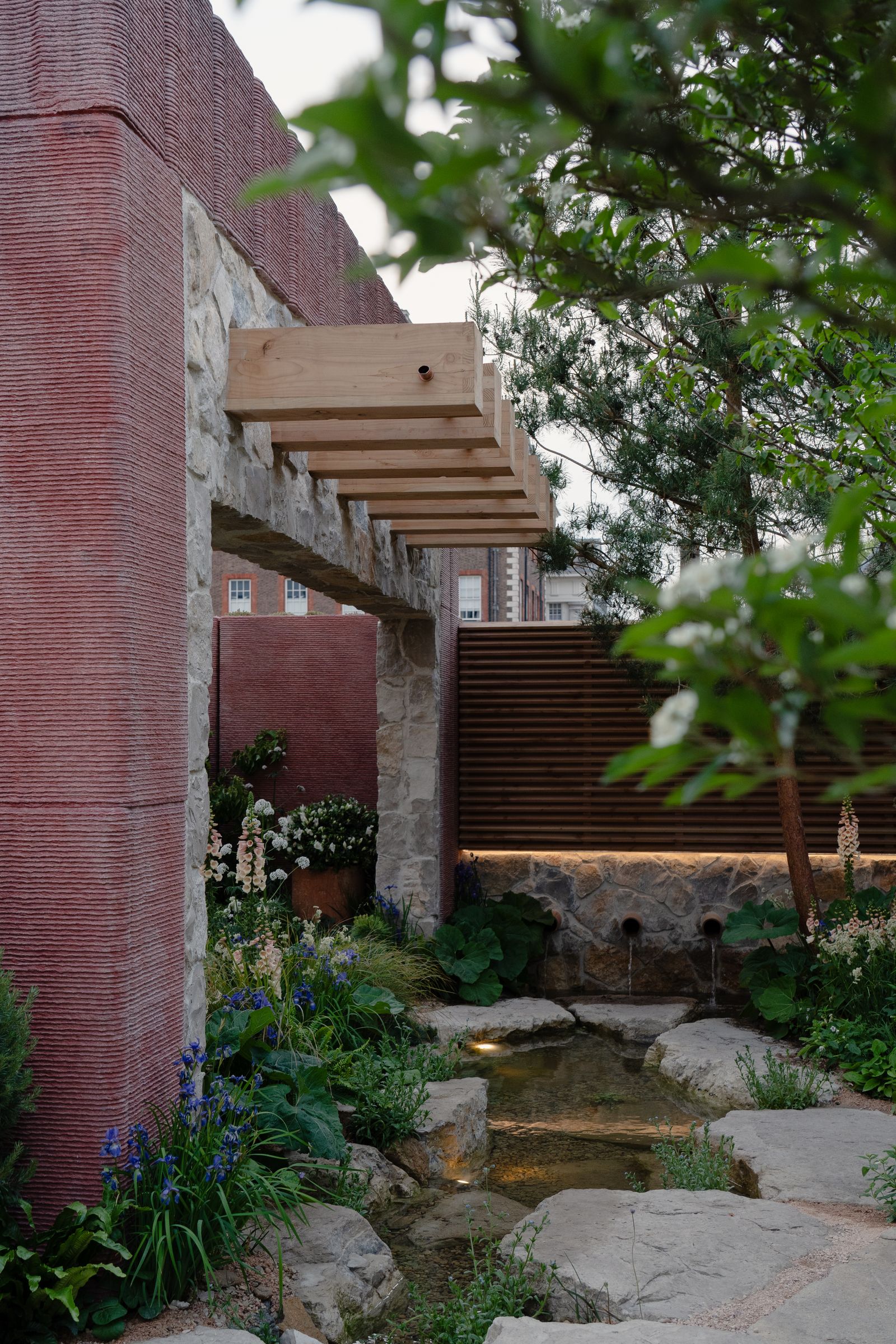 Image may contain Path Walkway Architecture Building House Housing Porch Patio Backyard Nature Outdoors and Yard