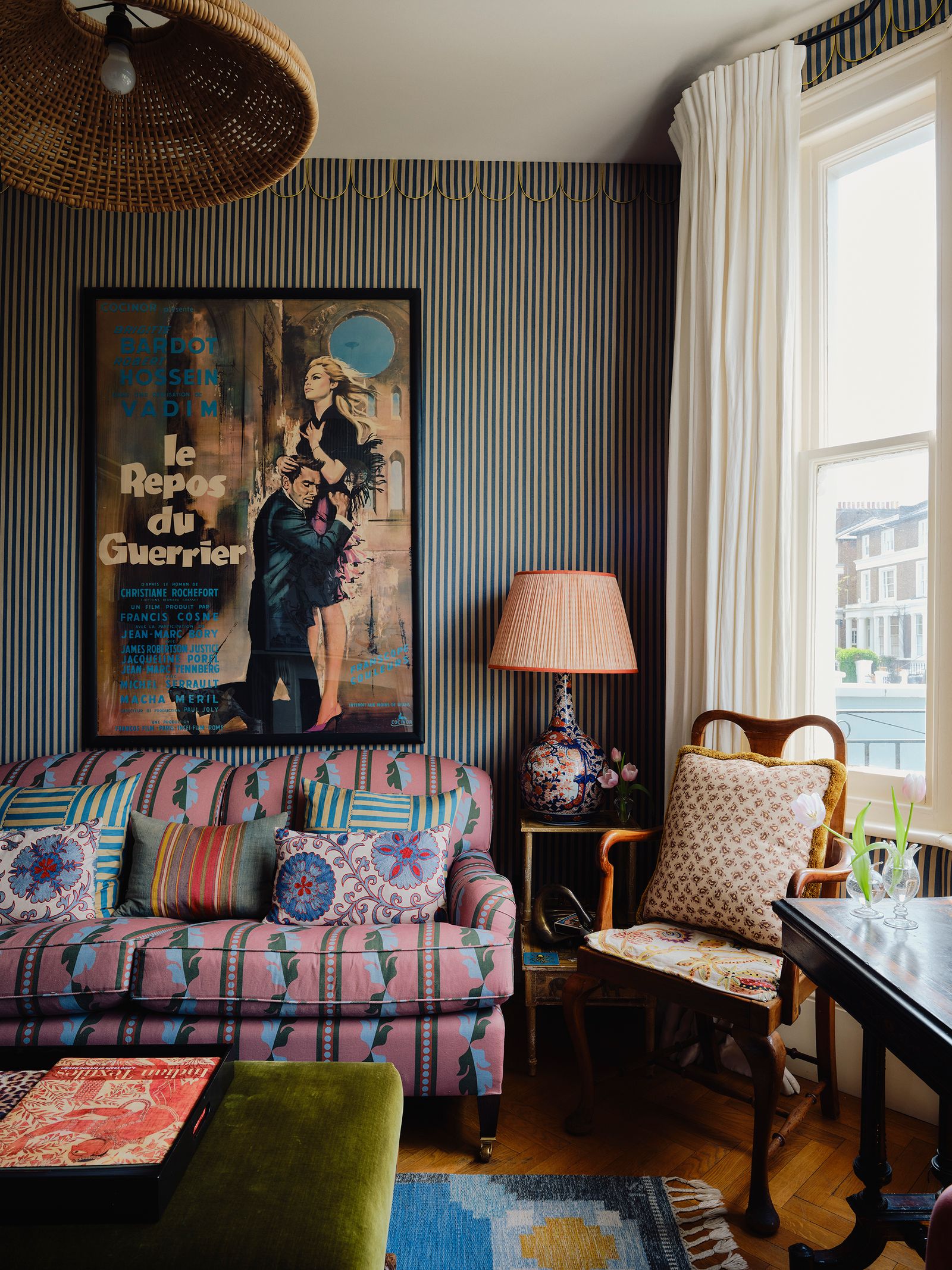 Image may contain Home Decor Indoors Interior Design Lamp Architecture Building Furniture Living Room and Room