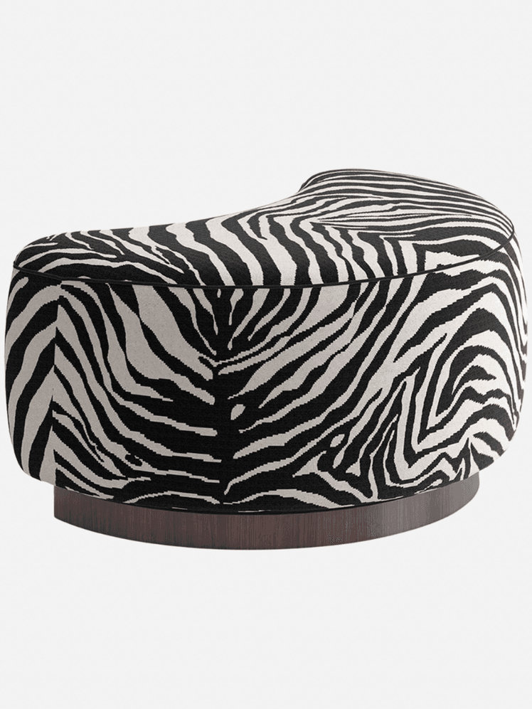 Image may contain: Furniture, Animal, Mammal, Wildlife, Zebra, and Ottoman
