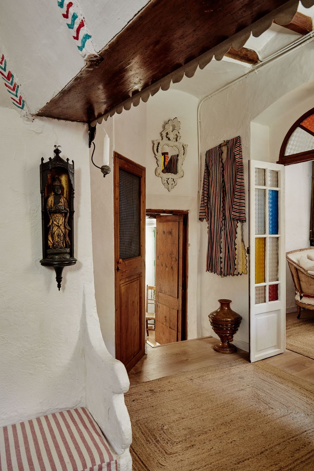 Image may contain Indoors Interior Design Floor Chair Furniture Wood Person Home Decor Rug and Architecture