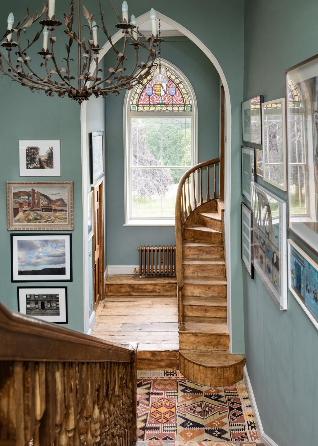 Image may contain Architecture Building Foyer Indoors Art Painting Lamp and Candle