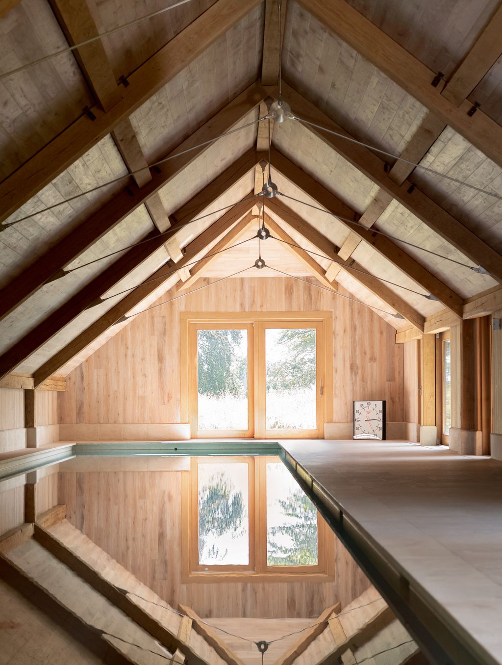 Image may contain Wood Indoors Interior Design Architecture Building House Housing Loft Room and Hardwood
