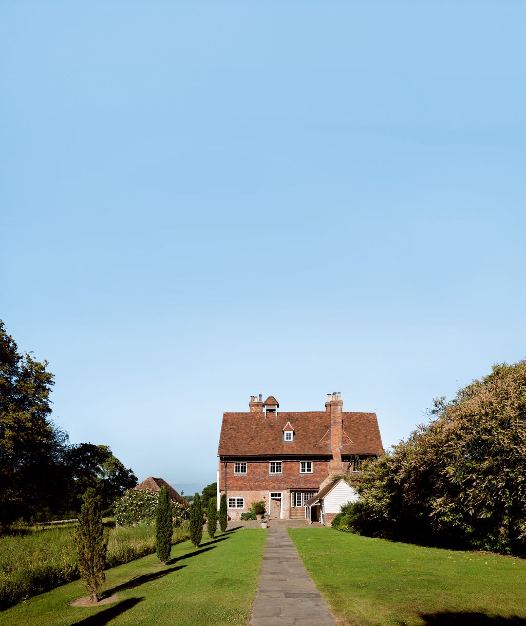 Image may contain Architecture Building Housing House Manor Plant and Outdoors