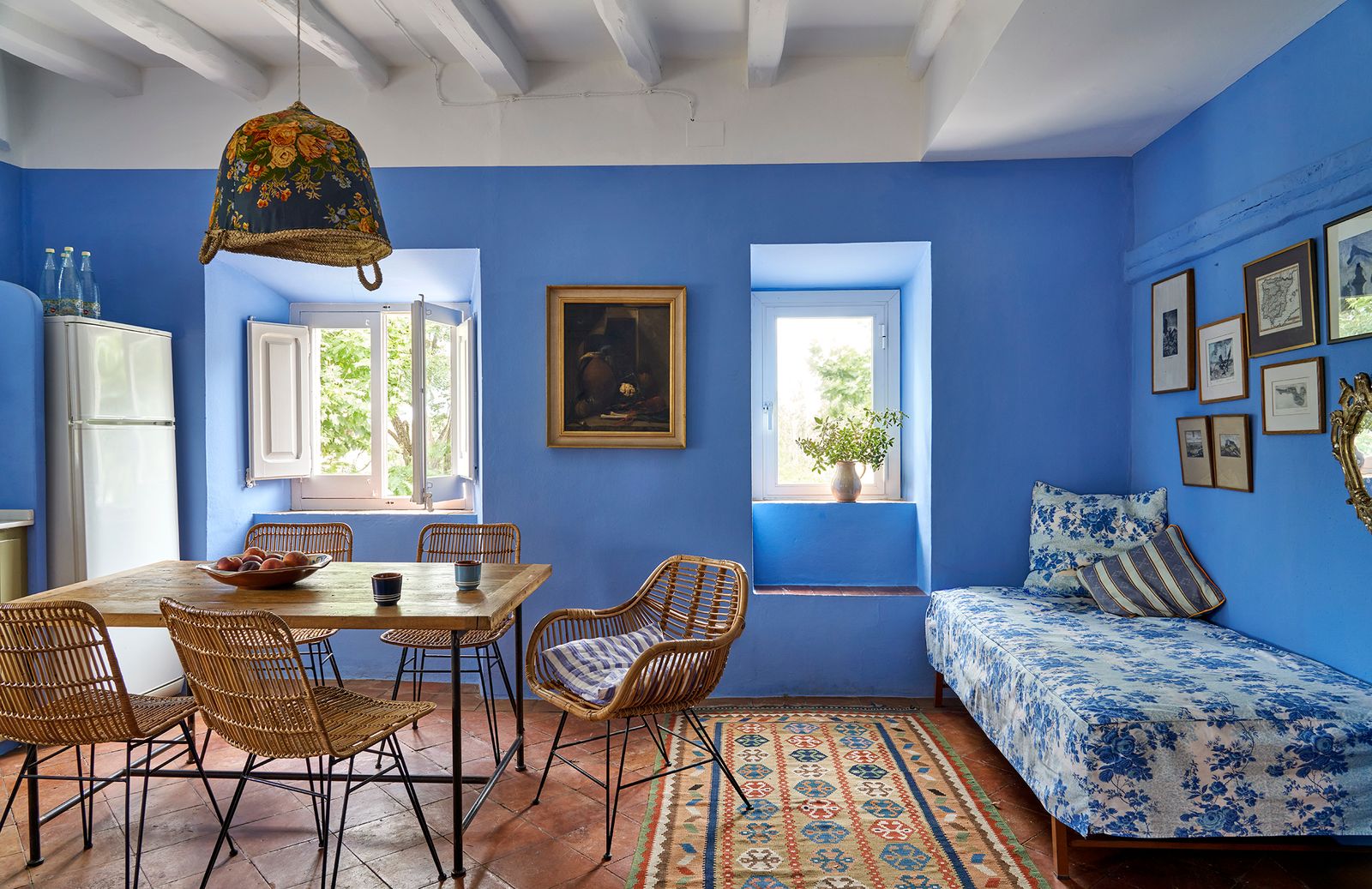 Image may contain Home Decor Chair Furniture Lamp Plant Art Painting Appliance Device and Electrical Device