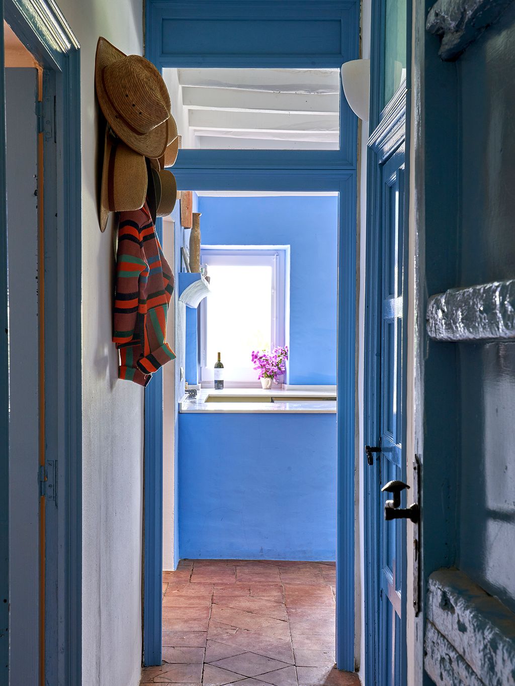 Image may contain Clothing Hat Floor and Indoors