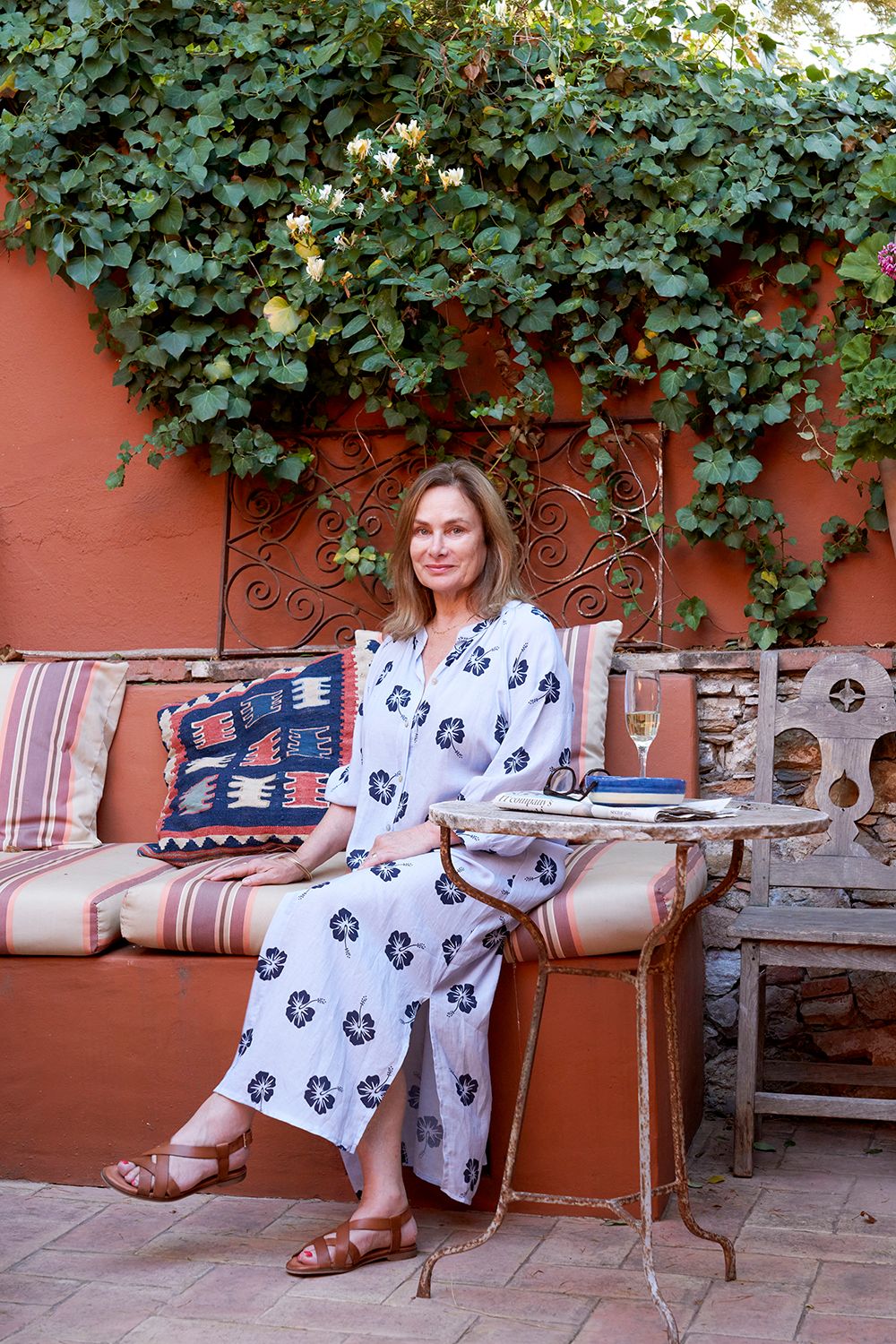 Image may contain Lisa Randall Person Sitting Face Head Photography Portrait Clothing Footwear Sandal and Adult