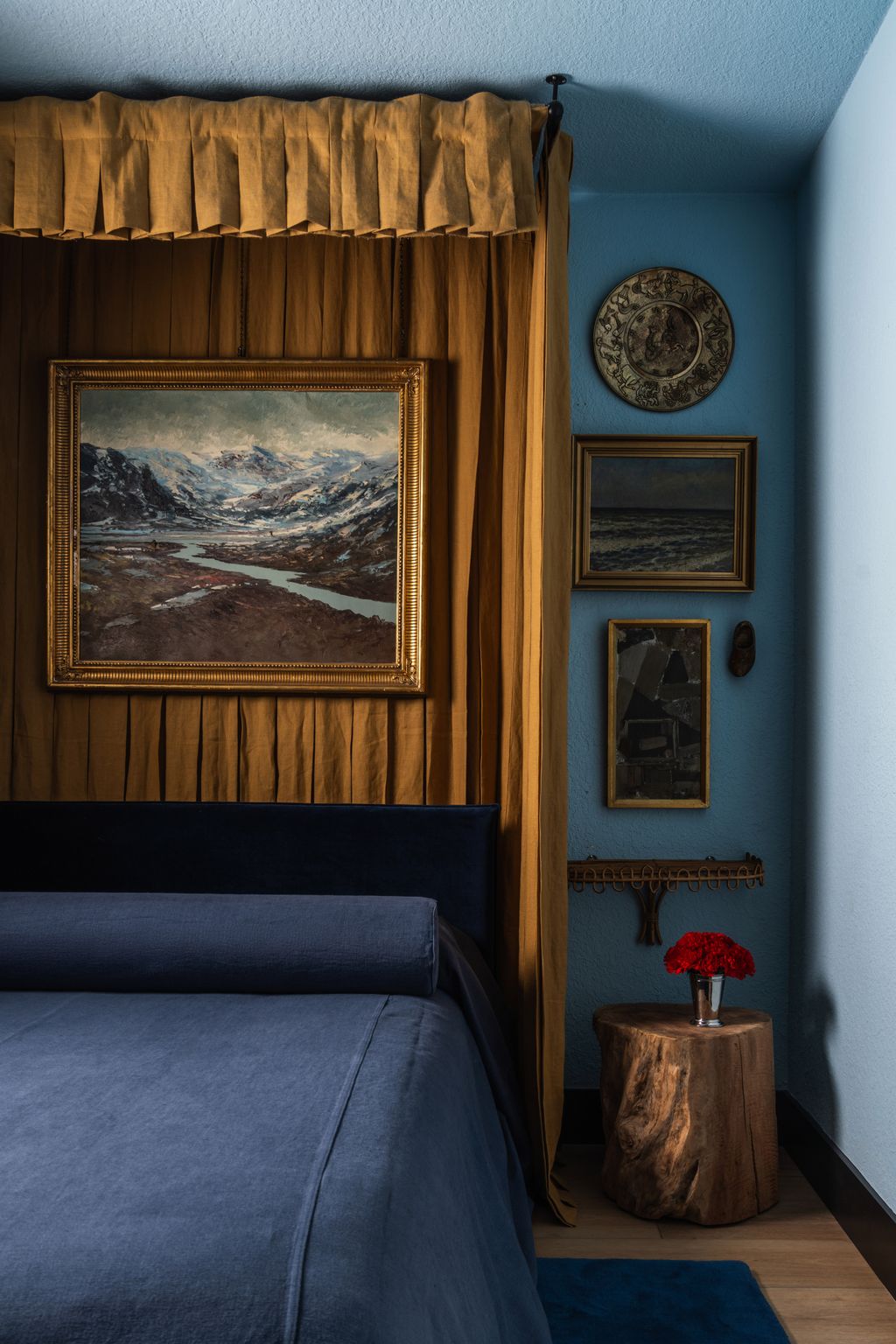 Image may contain Indoors Interior Design Art Painting Furniture Bed Bedroom Room Wood Plate and Wood Panels