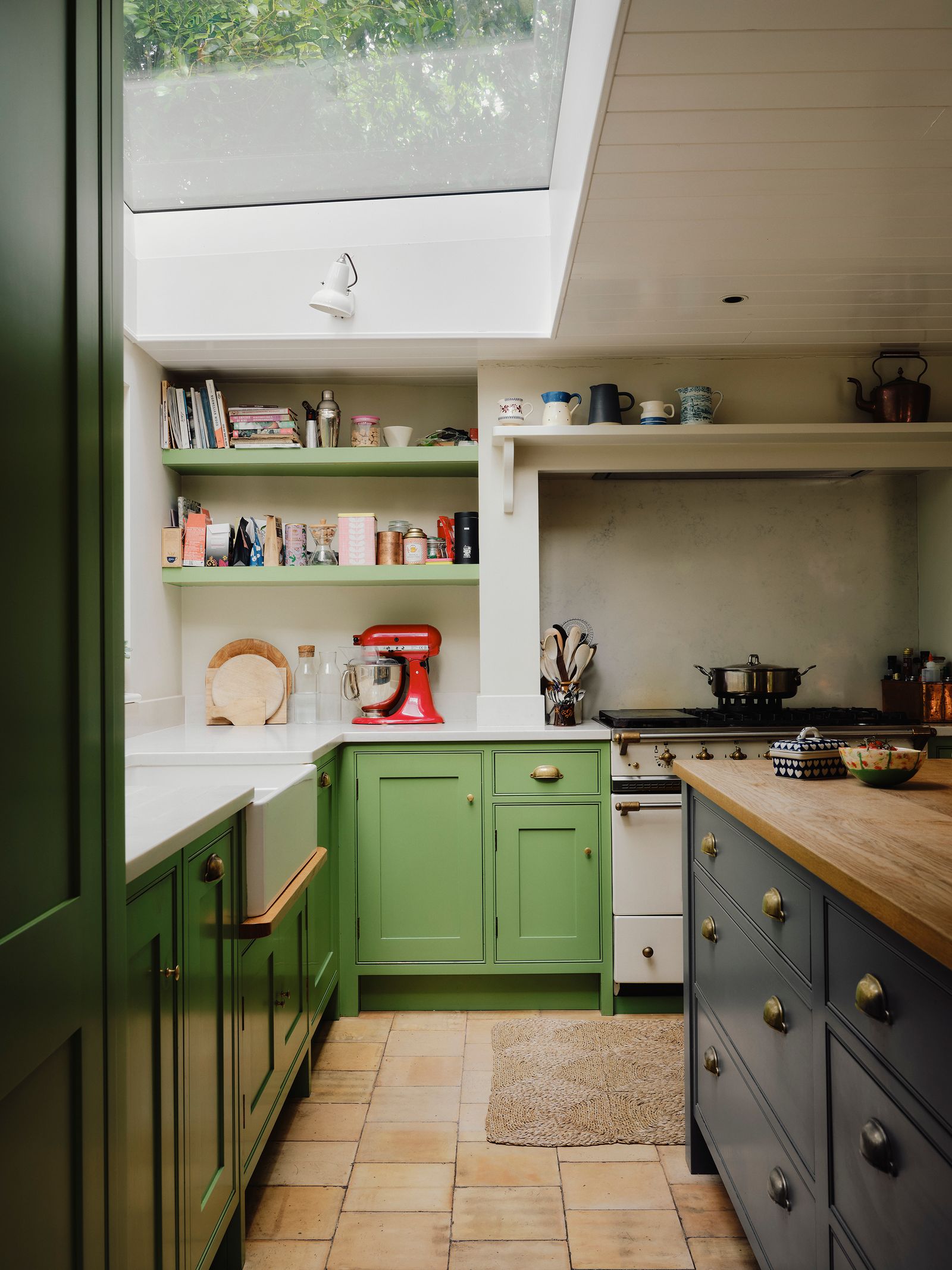 Image may contain Indoors Interior Design Kitchen Home Decor Rug Lamp Appliance Device Electrical Device and Mixer