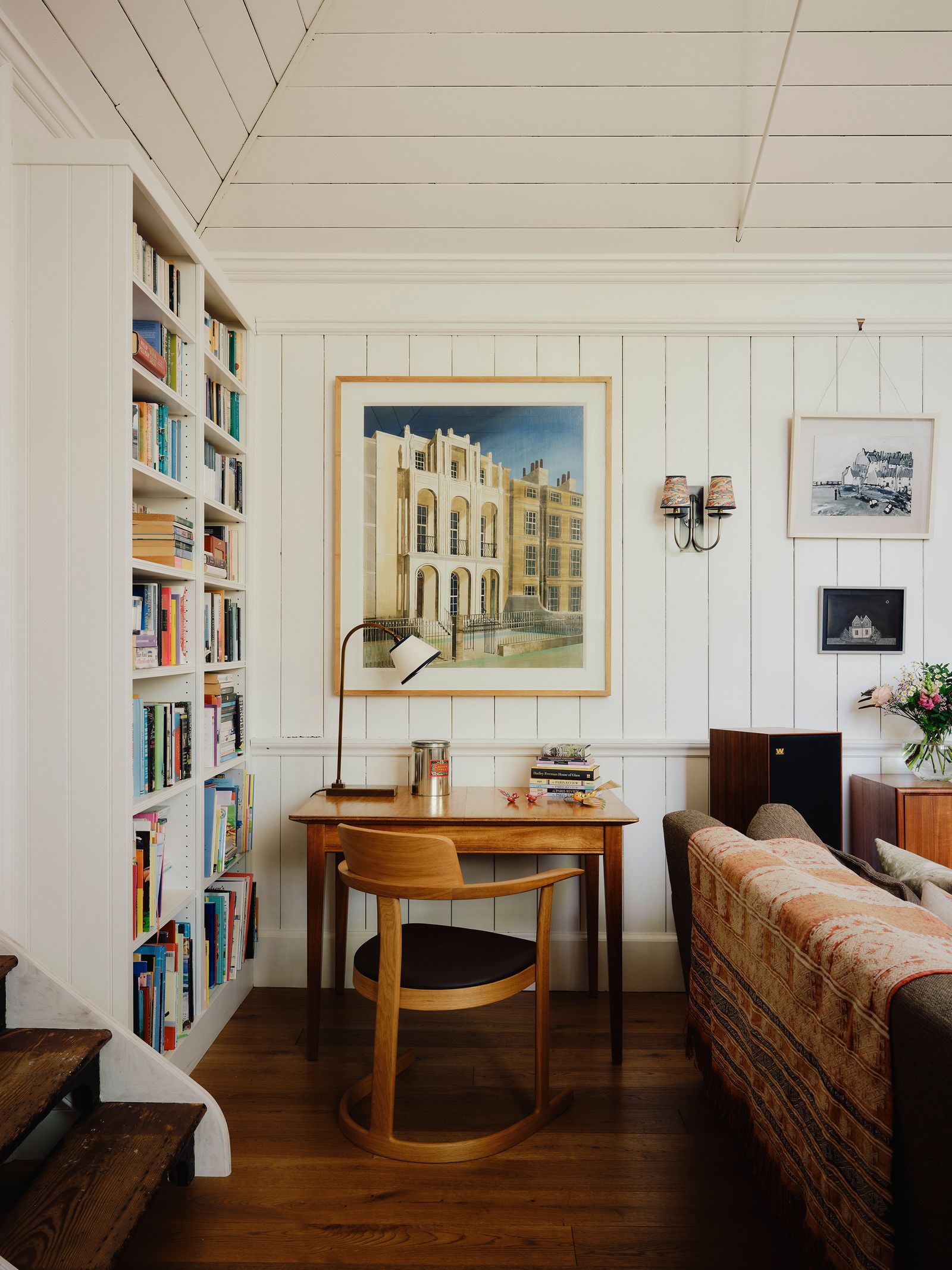 Image may contain Indoors Interior Design Desk Furniture Table Lamp Chair Couch Art Painting and Architecture