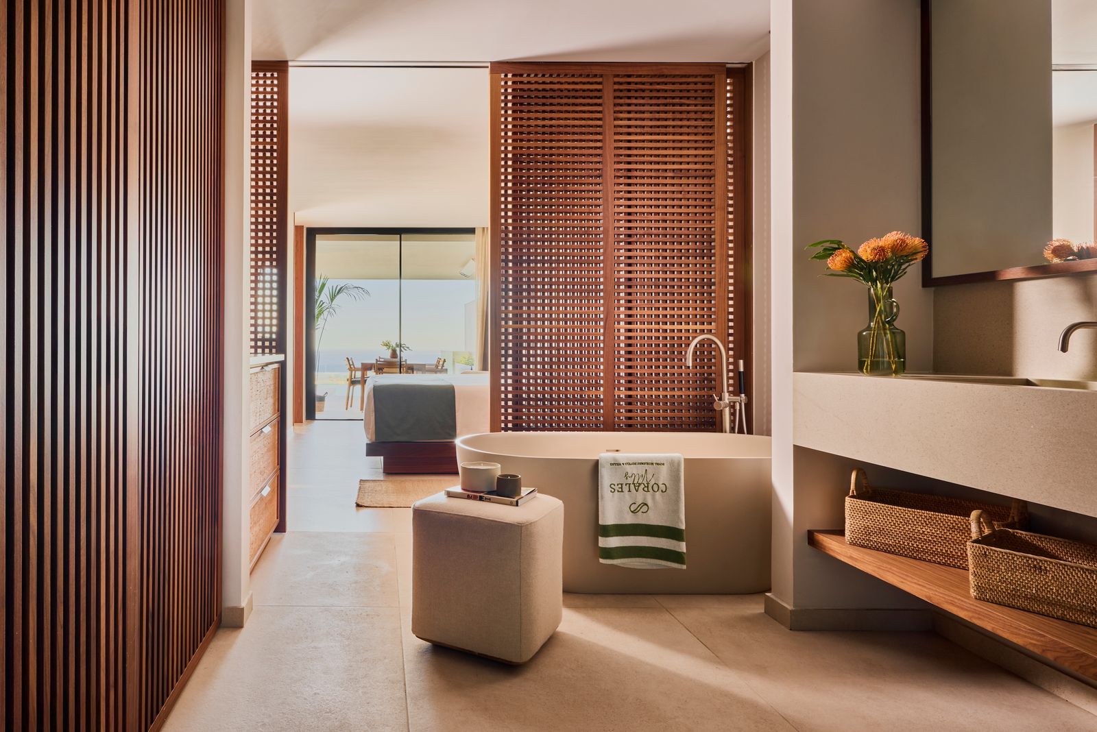 Image may contain Indoors Interior Design Home Decor Sink Sink Faucet Bathing Bathtub Person Tub and Book