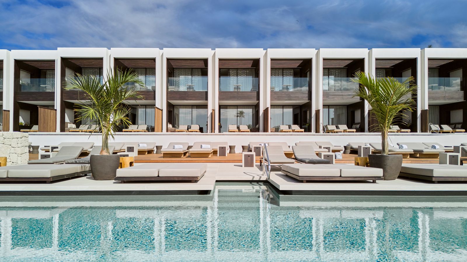 Image may contain Royal Hideaway Corales Villas Tenerife Plant Architecture Building House Housing Villa Pool Water...