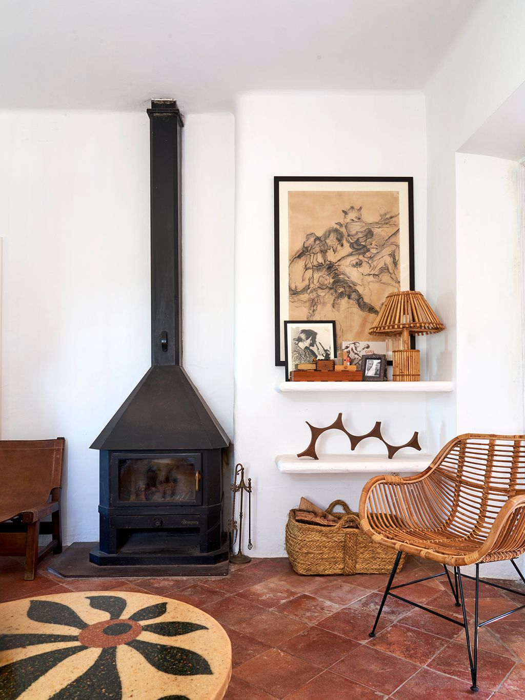 Image may contain Home Decor Fireplace Indoors Lamp Chair Furniture Interior Design Art Painting Rug and Floor