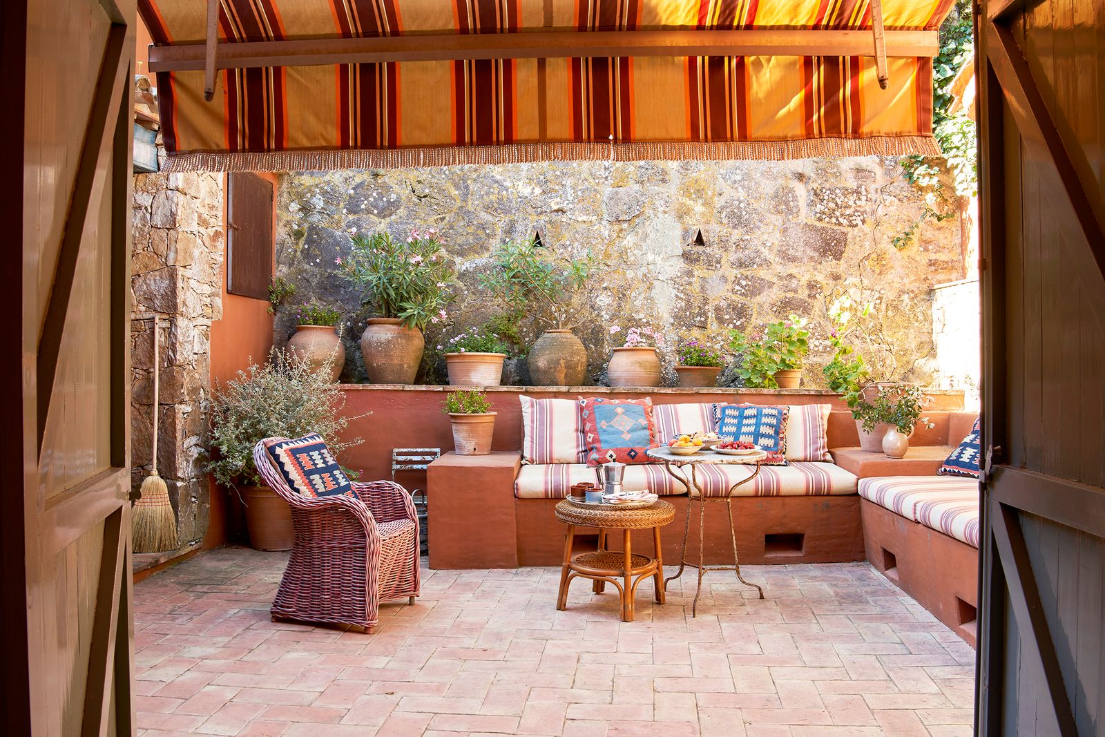 Image may contain Plant Chair Furniture Floor Indoors Interior Design Couch Cup Architecture Balcony and Building