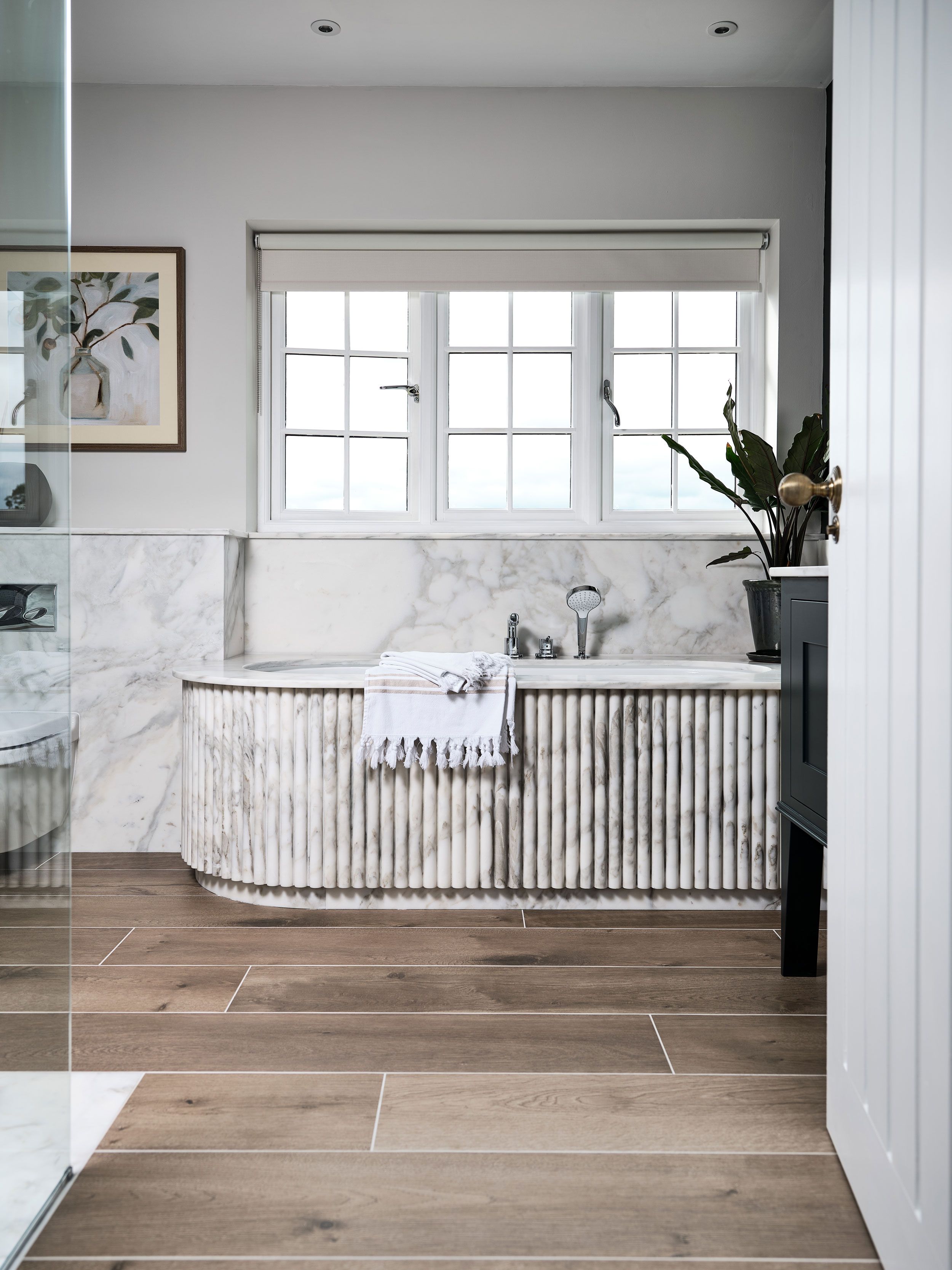 Image may contain: Indoors, Interior Design, Floor, Flooring, Plant, Art, Painting, Sink, and Sink Faucet