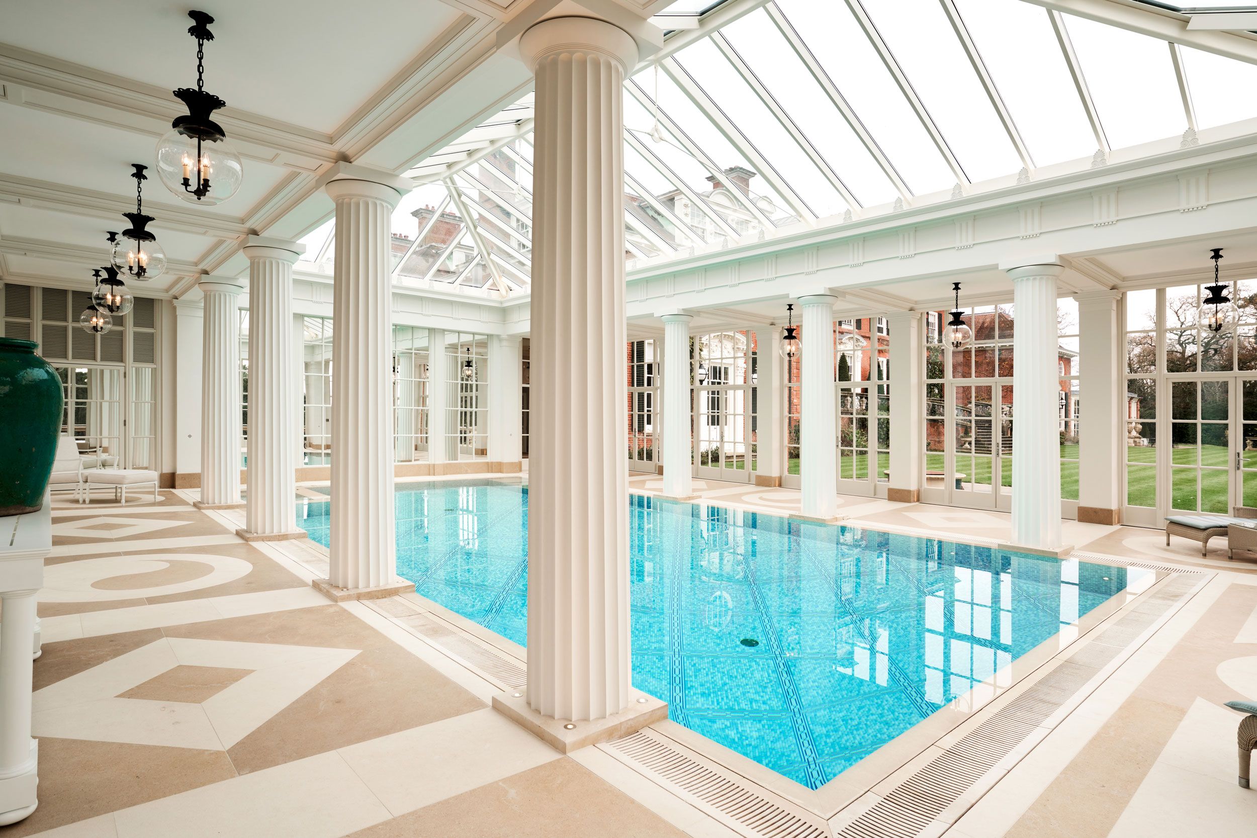 Image may contain: Pool, Water, Swimming Pool, Lamp, Floor, Chair, and Furniture