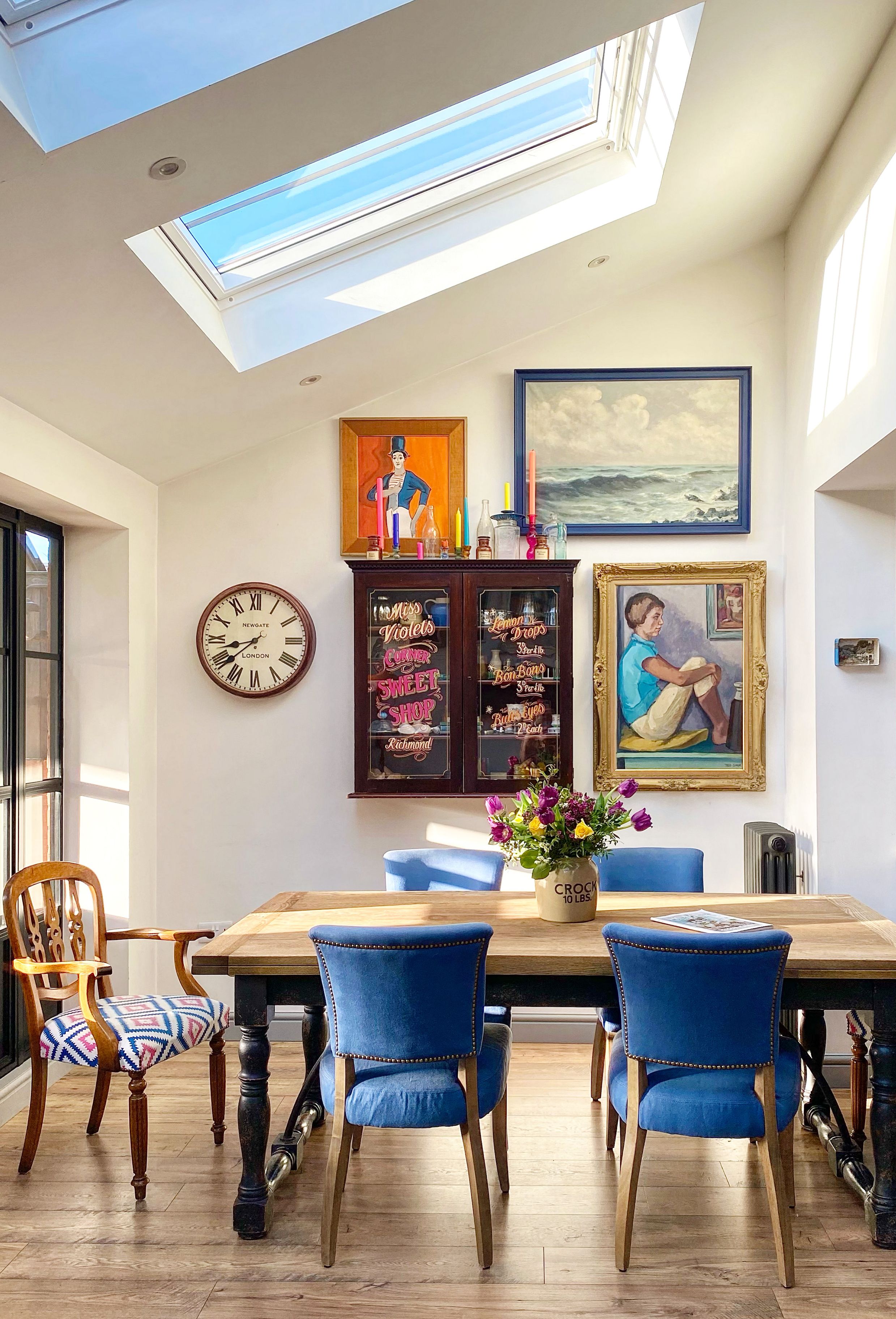 Image may contain: Desk, Furniture, Table, Art, Painting, Window, Chair, Architecture, Building, and Dining Room