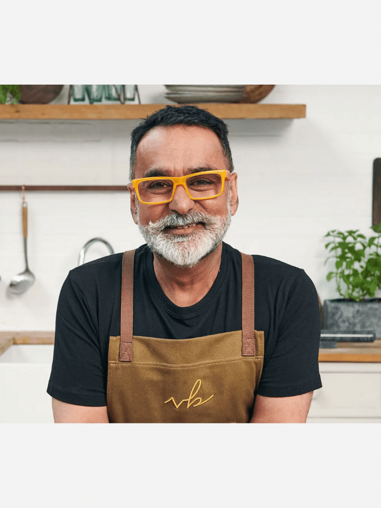 Image may contain: Adult, Person, Face, Head, Cutlery, and Spoon