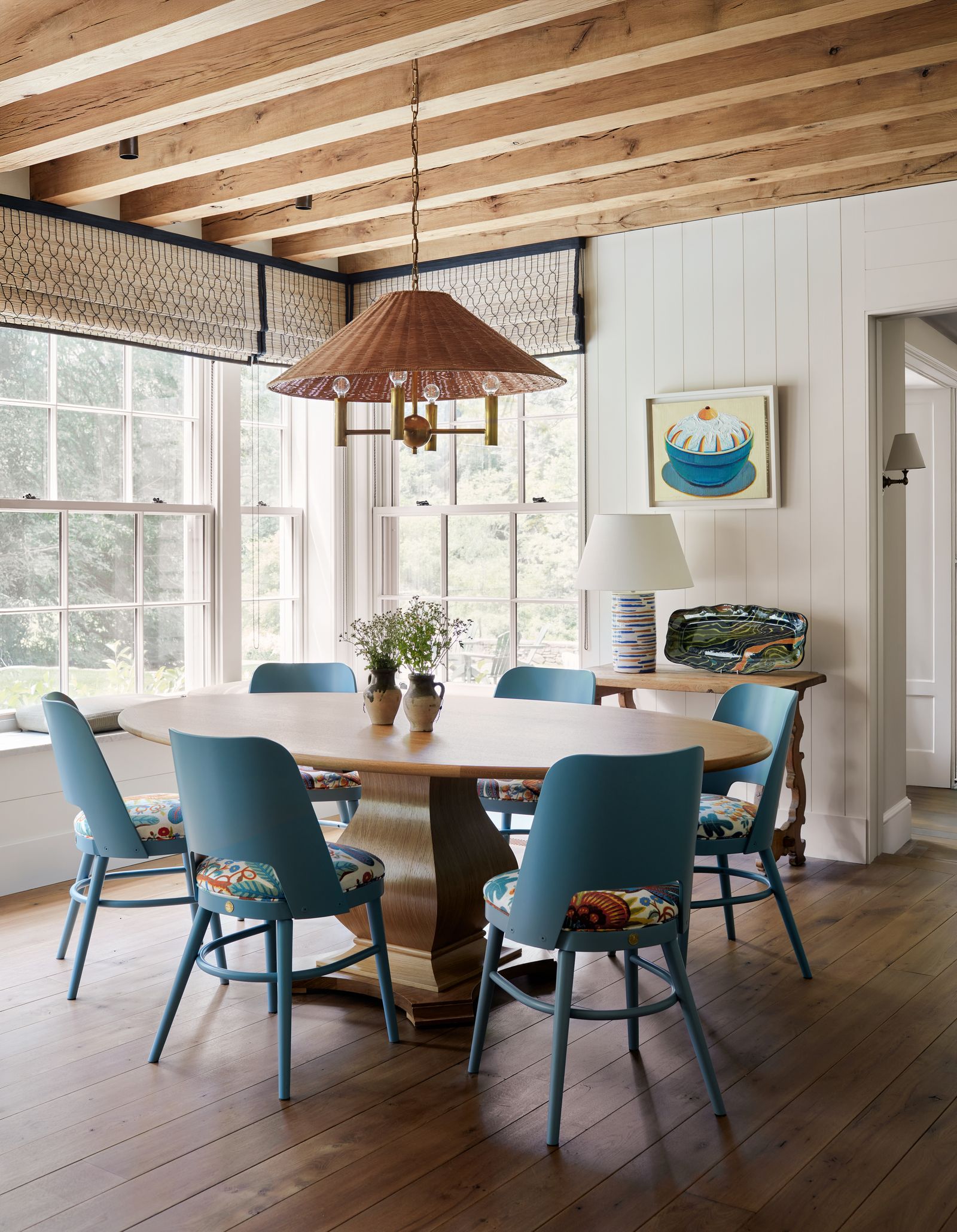 Image may contain Indoors Interior Design Architecture Building Dining Room Dining Table Furniture Room and Table