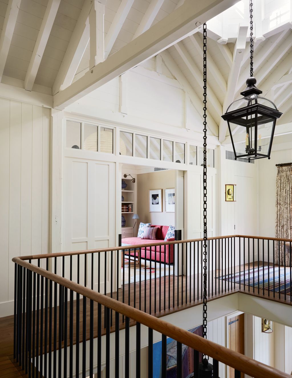 Image may contain Indoors Interior Design Lamp Architecture Building Foyer Art Painting Bed Furniture and House