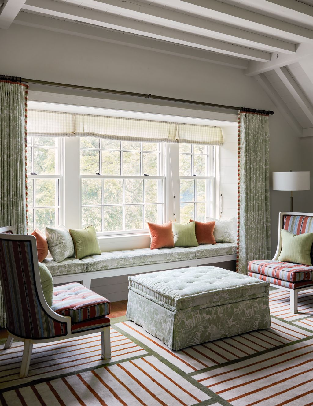 Image may contain Chair Furniture Lamp Home Decor Rug Bench Window and Bay Window