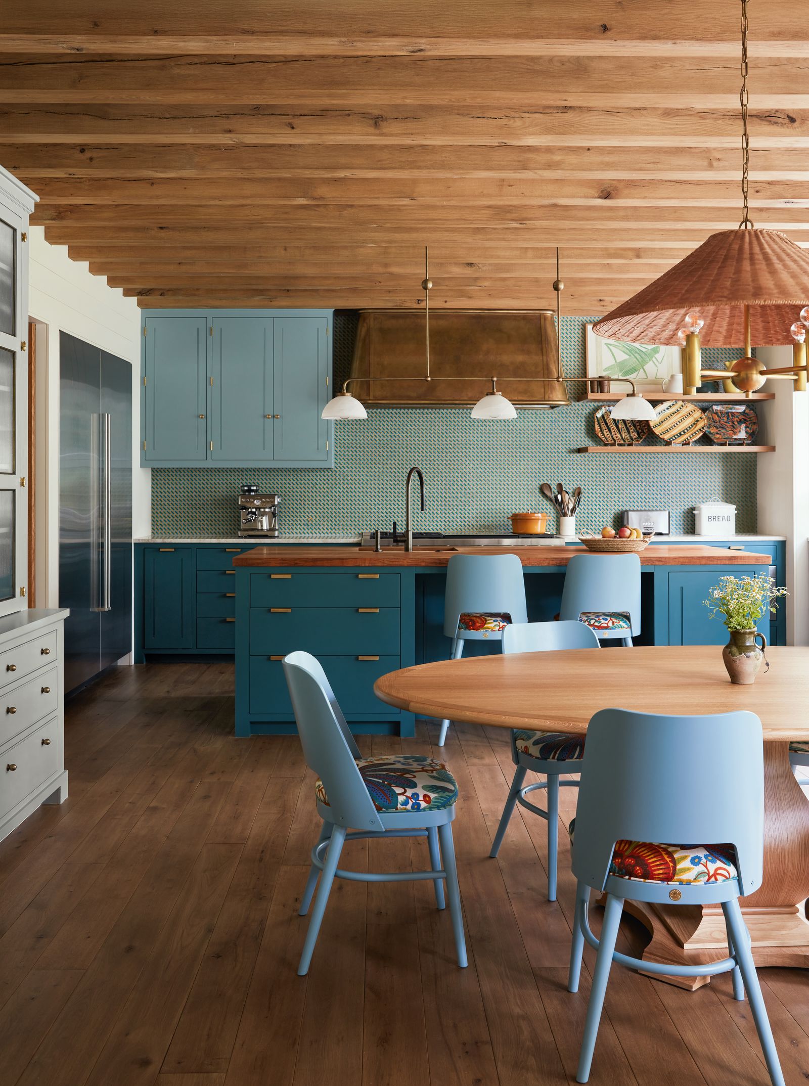 Image may contain Indoors Interior Design Wood Chair Furniture Kitchen Architecture Building and Dining Room