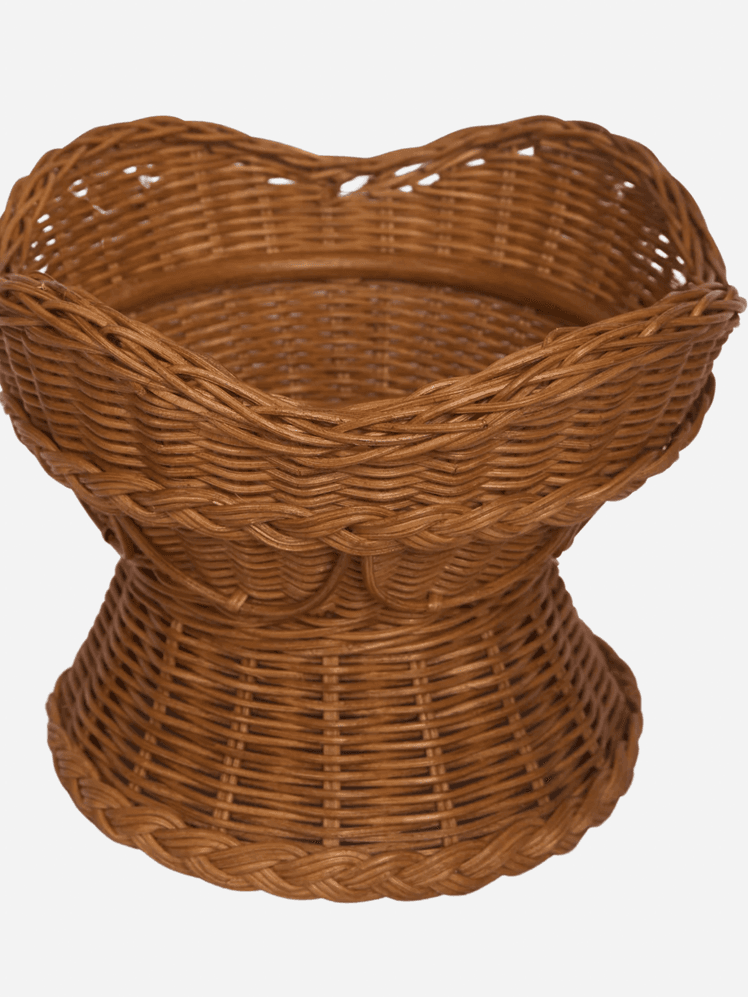 Image may contain: Basket, Crib, Furniture, Infant Bed, Art, Handicraft, and Woven