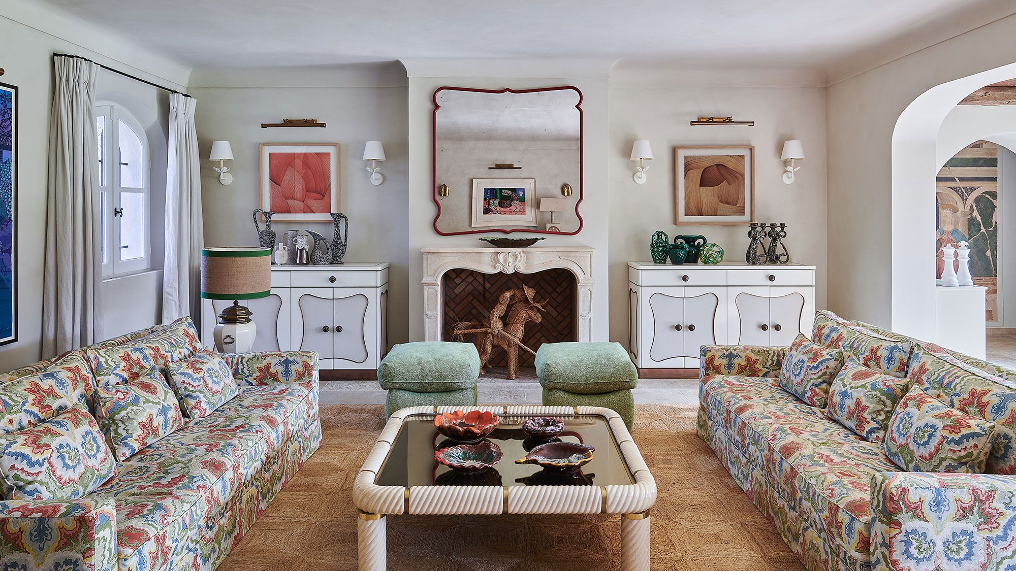 Image may contain: Home Decor, Lamp, Art, Painting, Couch, Furniture, Table, Architecture, Building, Indoors, and Living Room