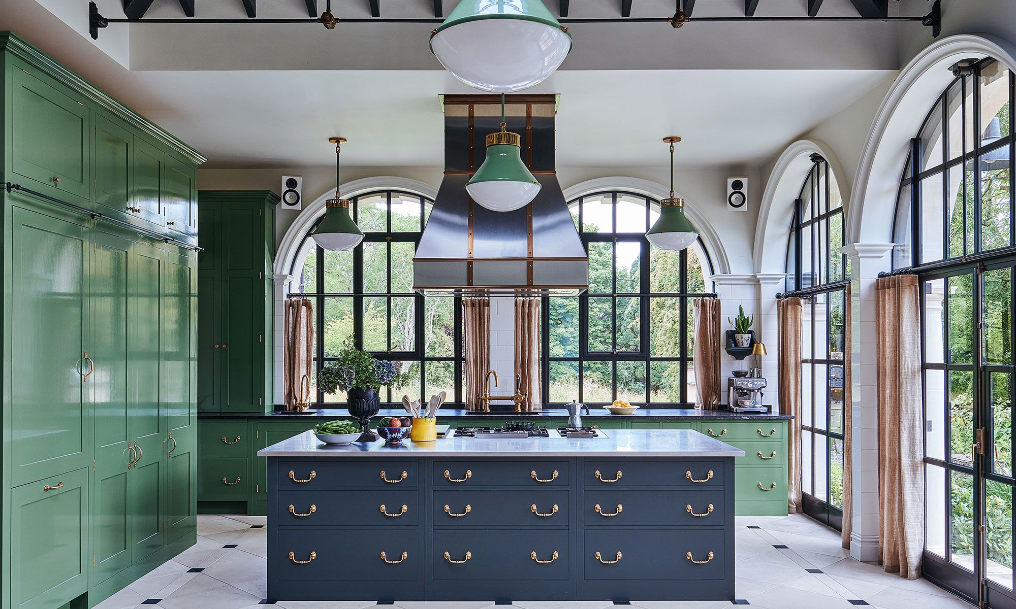 Image may contain: Lamp, Indoors, Interior Design, Kitchen, Plant, Electronics, Speaker, Cup, and Window