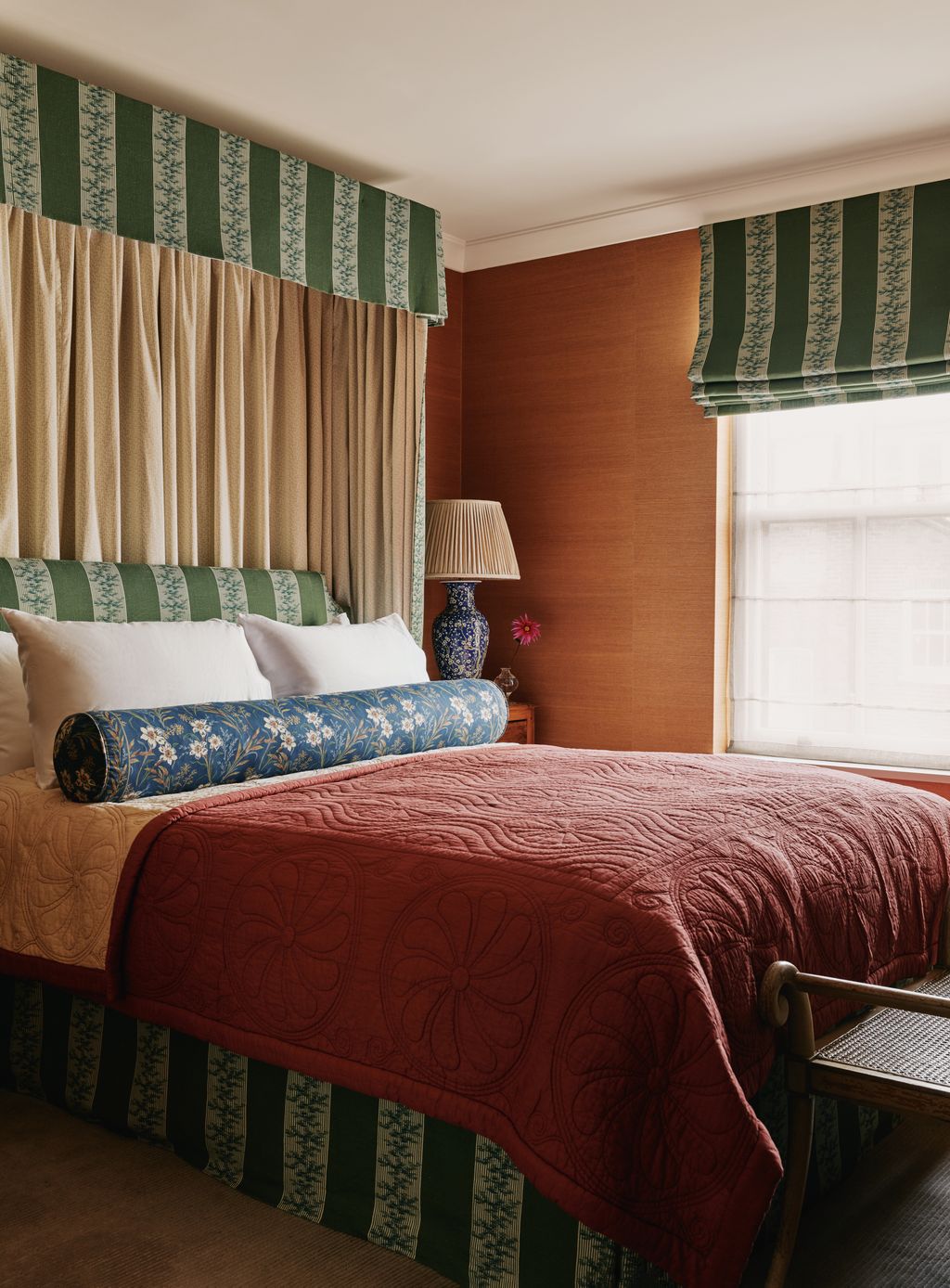 Image may contain Indoors Interior Design Lamp Cushion Home Decor Bed Furniture Bedroom Room and Chair