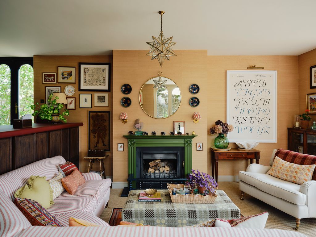 Image may contain Home Decor Couch Furniture Plant Fireplace Indoors Architecture Building Living Room and Room