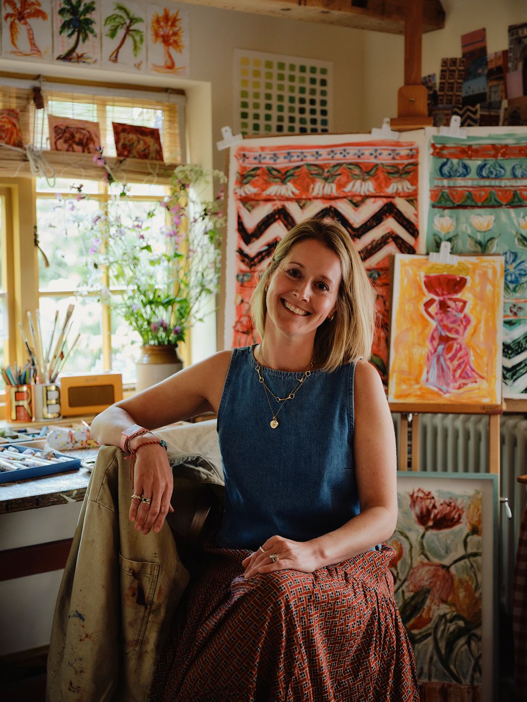 Image may contain Adult Person Face Head Photography Portrait Accessories Jewelry Necklace Sitting Ring and Happy