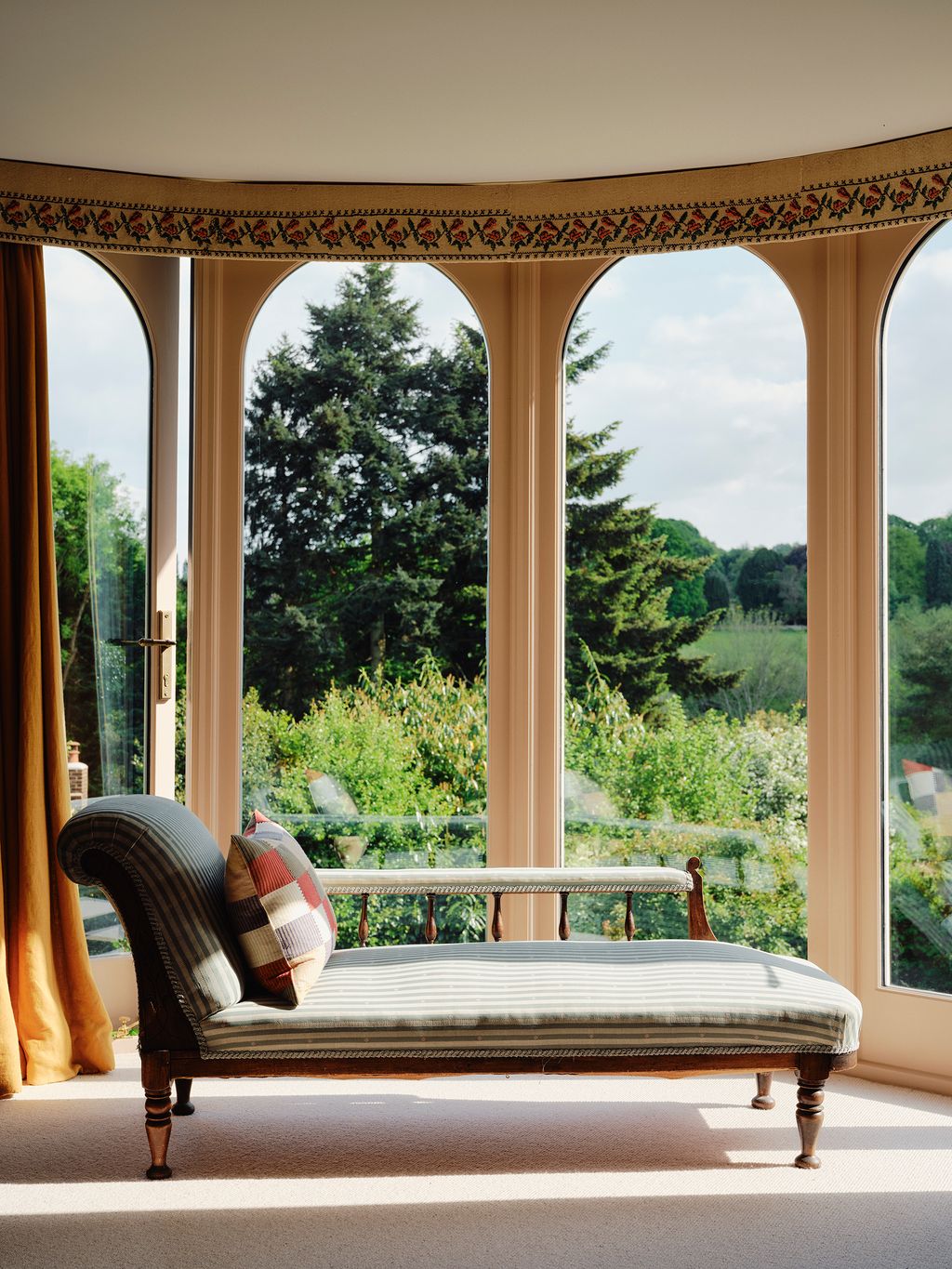 Image may contain Window Bench Furniture Bay Window and Chaise