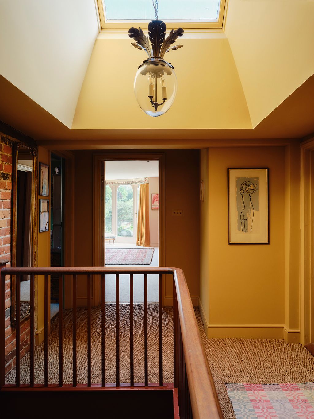 Image may contain Art Painting Home Decor Rug Lamp Indoors Floor Architecture Building Foyer and Interior Design