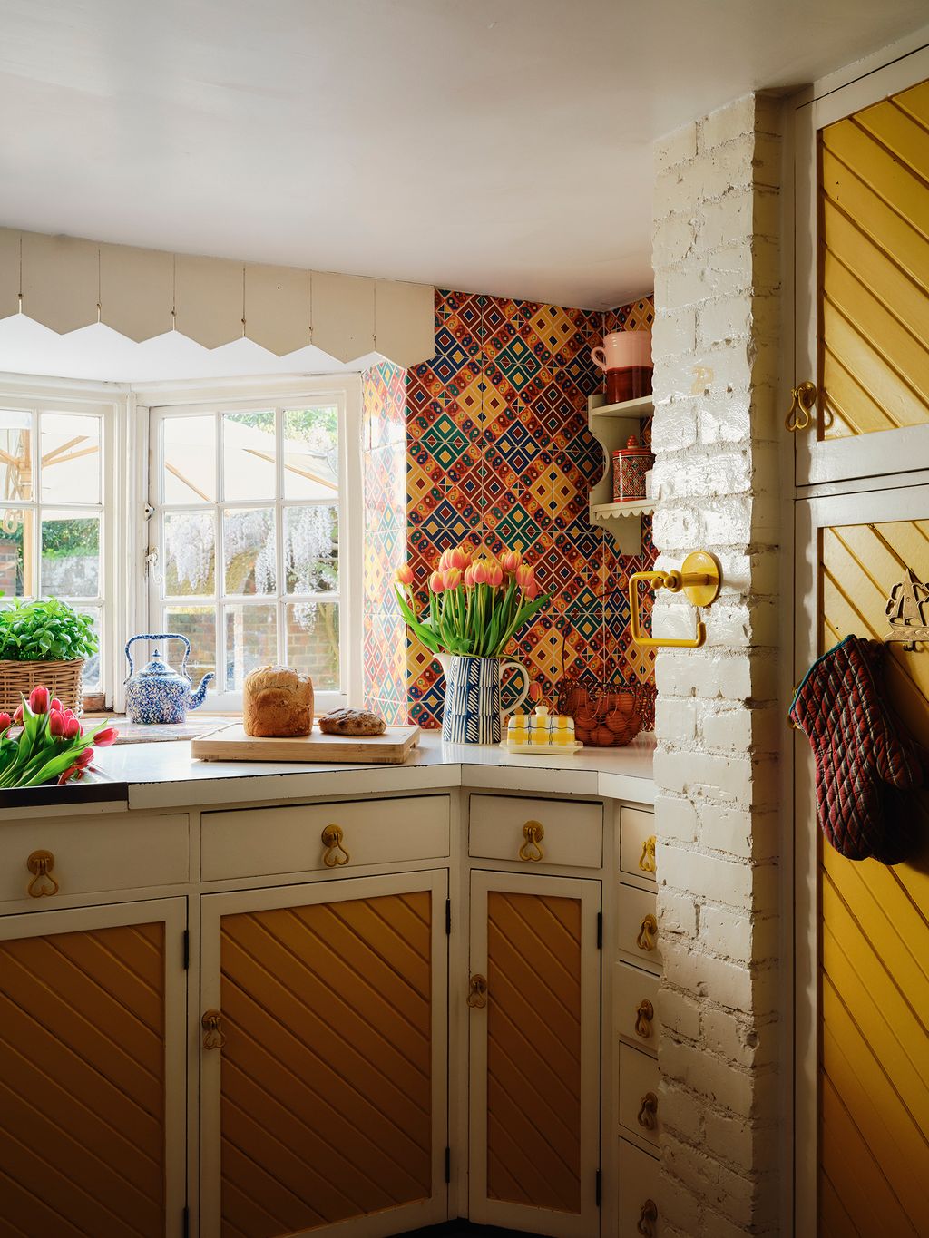 Image may contain Indoors Interior Design Plant Window Bread Food Accessories Bag Handbag and Bay Window