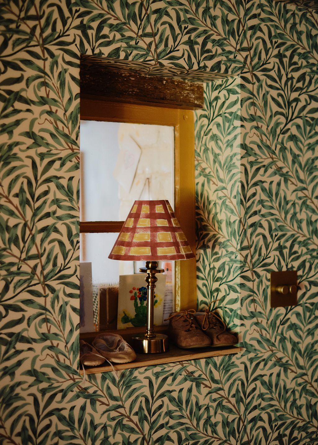 Image may contain Lamp Indoors Interior Design Clothing Footwear Shoe Table Lamp Window and Windowsill